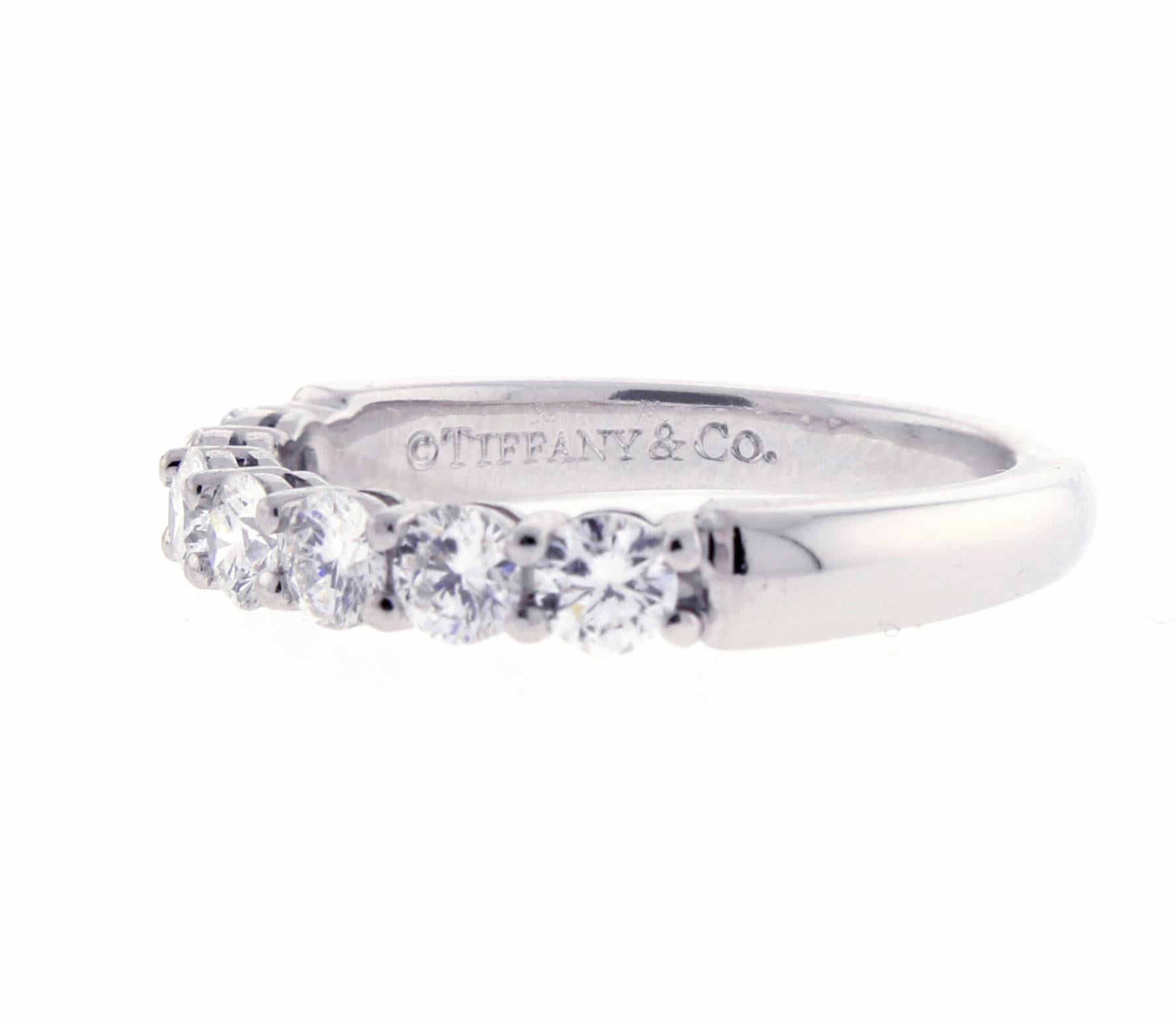 From Tiffany and Co thier shared prong 7 diamond band ring.
♦ Designer / Hallmarks: Tiffany & Co
♦ Metal: Platinum
♦ Gem stone: 7 Diamonds = .58 total carats F-G/VVS-VS
♦ Design Era: Contemporary
♦ Circa 2010
♦ Size: 5, Resizeable
♦ Weight 4.3
