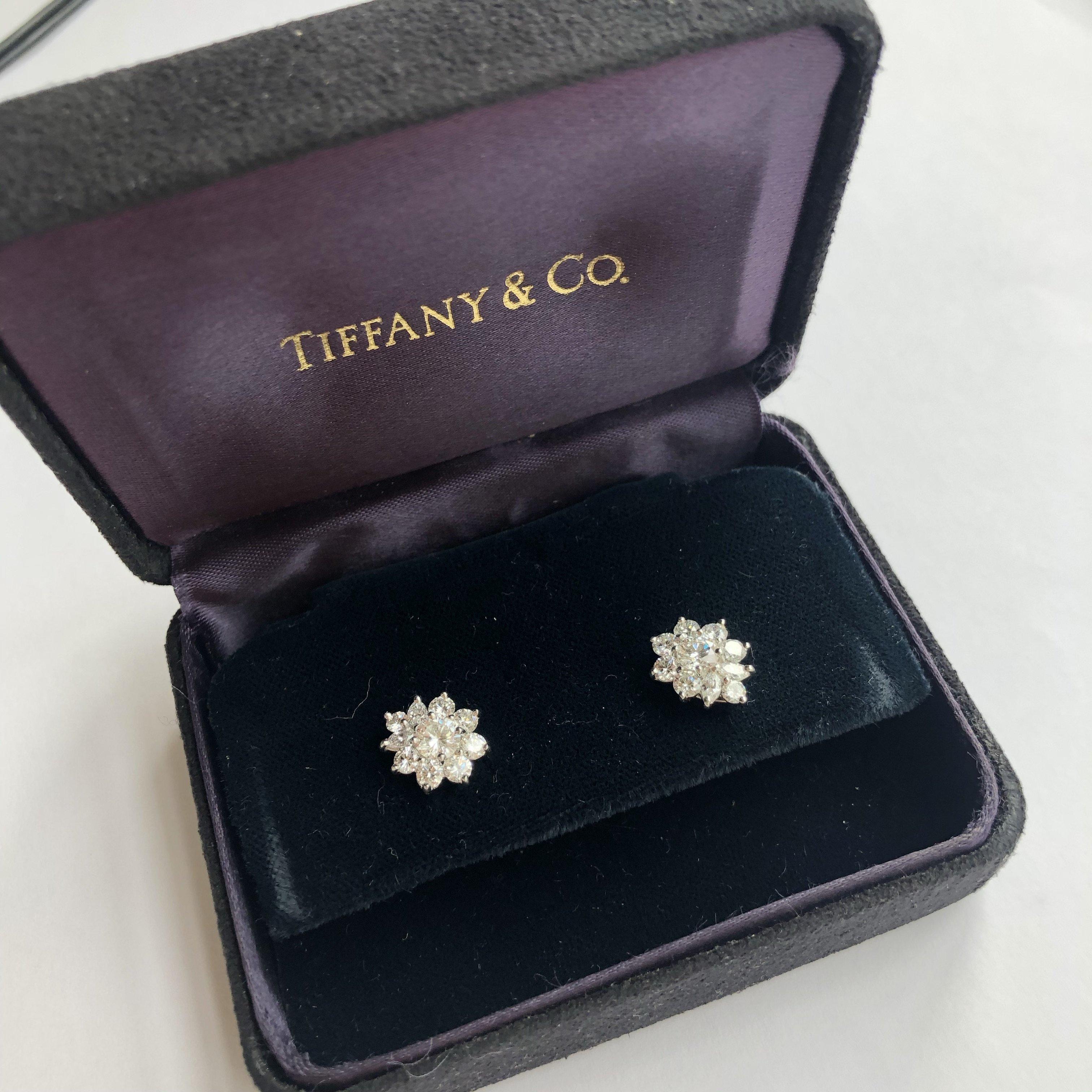 These Tiffany cluster earrings are breathtaking! The unbelievable sparkly diamonds total approximately 2cts, are F colour VVS1 and the earrings are modelled in platinum. They are fully hallmarked and come in their original box. 

Cluster Dimensions: