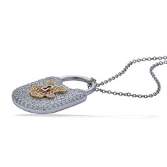 Tiffany & Co. Platinum and 18K Gold Diamond Lock Pendant Necklace, .95 Carats