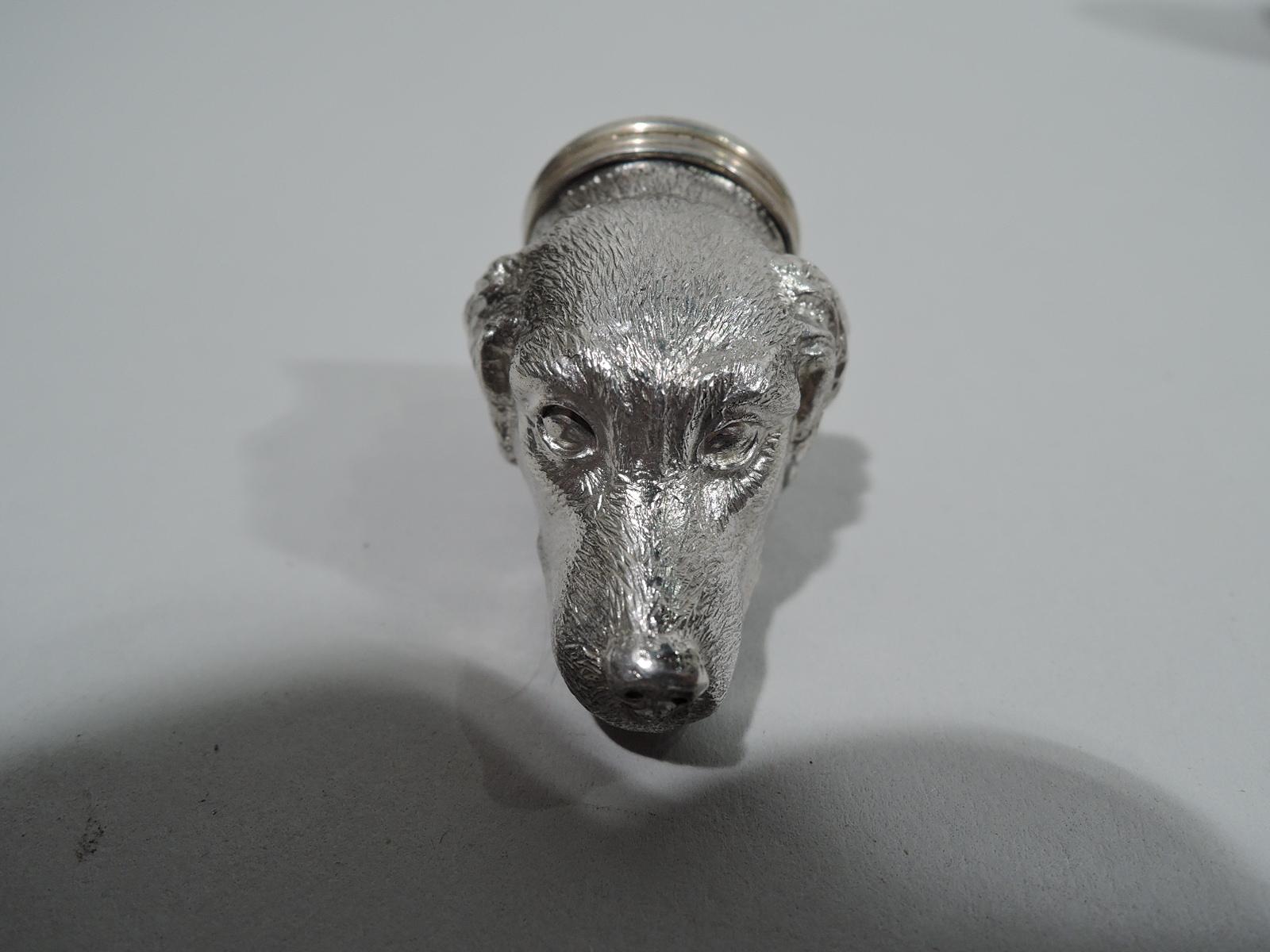 English sterling silver figural pillbox, 1972. Cast dog head with floppy ears and alert nose. A sweet retriever with more feel-better to be kept in the gilt interior. Hinged cover closes securely. English marks include Tiffany stamp. Weight: 1 troy