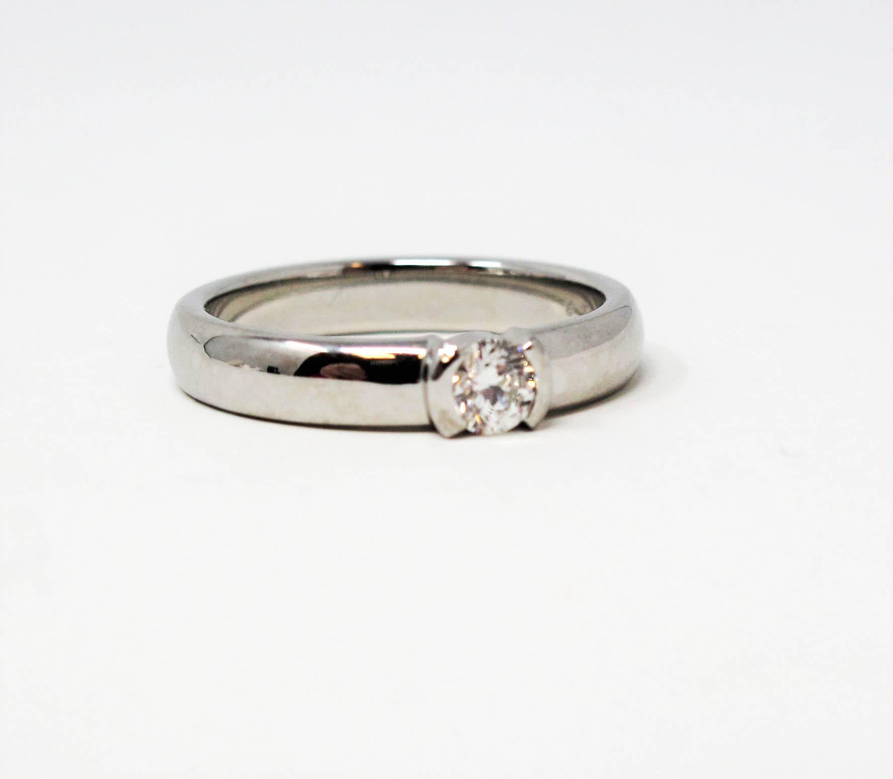 Round Cut Tiffany & Co. Etoile Ideal Cut Diamond Solitaire Ring in Platinum .20 Carat