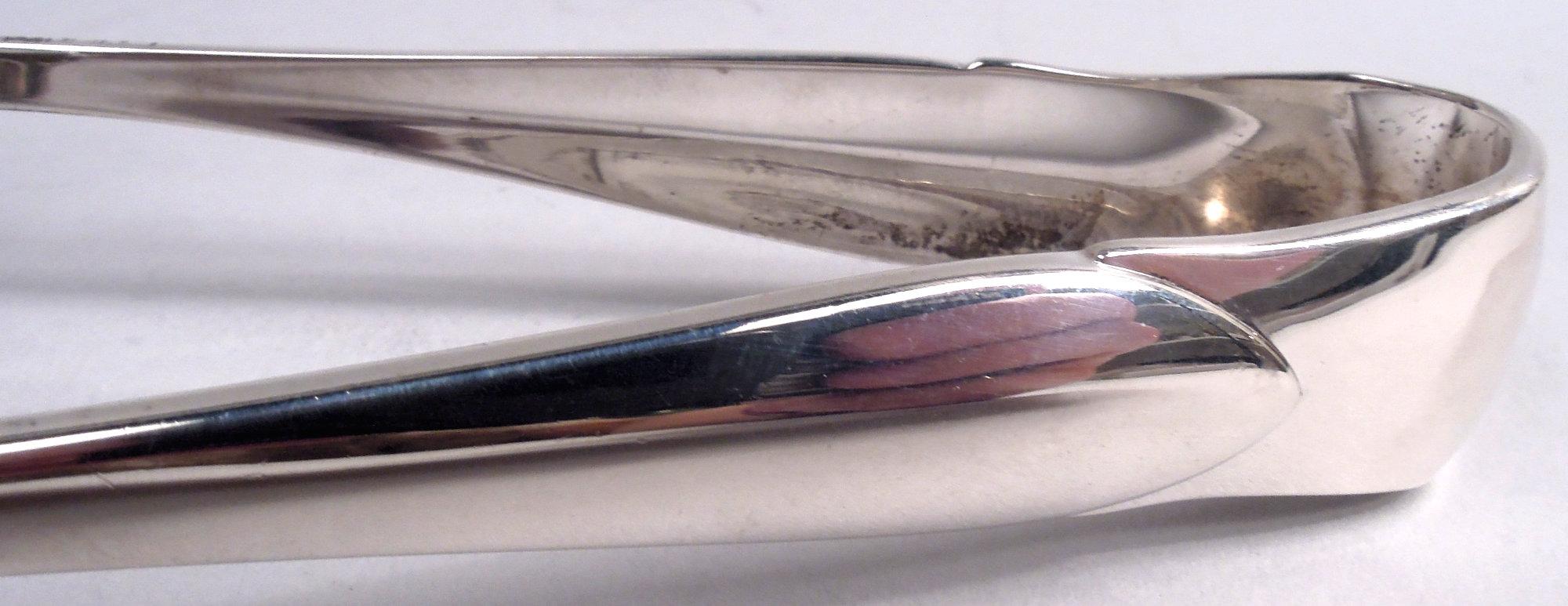 Pinzas para hielo Tiffany Faneuil de plata de ley con mandíbulas de tulipán siglo XX en venta