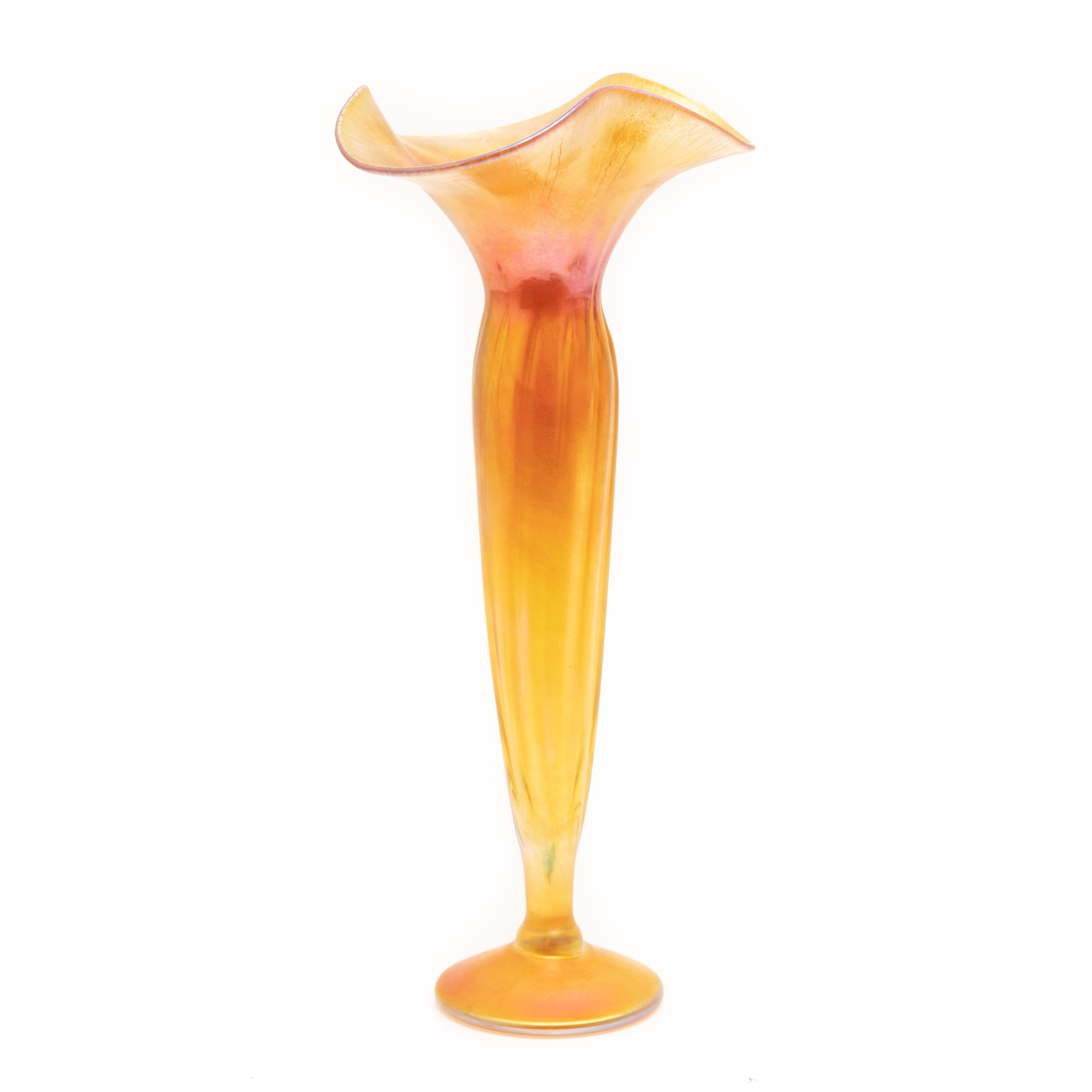 Tiffany Favrile art glass floriform vase, gold iridescent tulip with ruffle rim, marked LCT Favrile m-4914 on bottom, height 13 in.