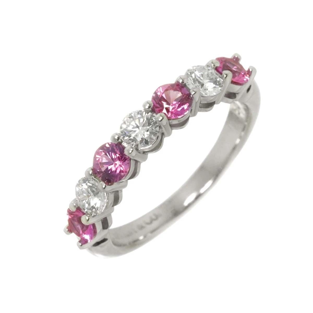 TIFFANY & Co. Anello Forever in platino da 3,5 mm con diamante e zaffiro rosa a metà cerchio 6

Metallo: Platino
Dimensione: 6
Larghezza della banda: 3.5 mm
Peso: 5,40 grammi
Diamante: 3 diamanti tondi brillanti, peso totale .39 carati
Zaffiro rosa: