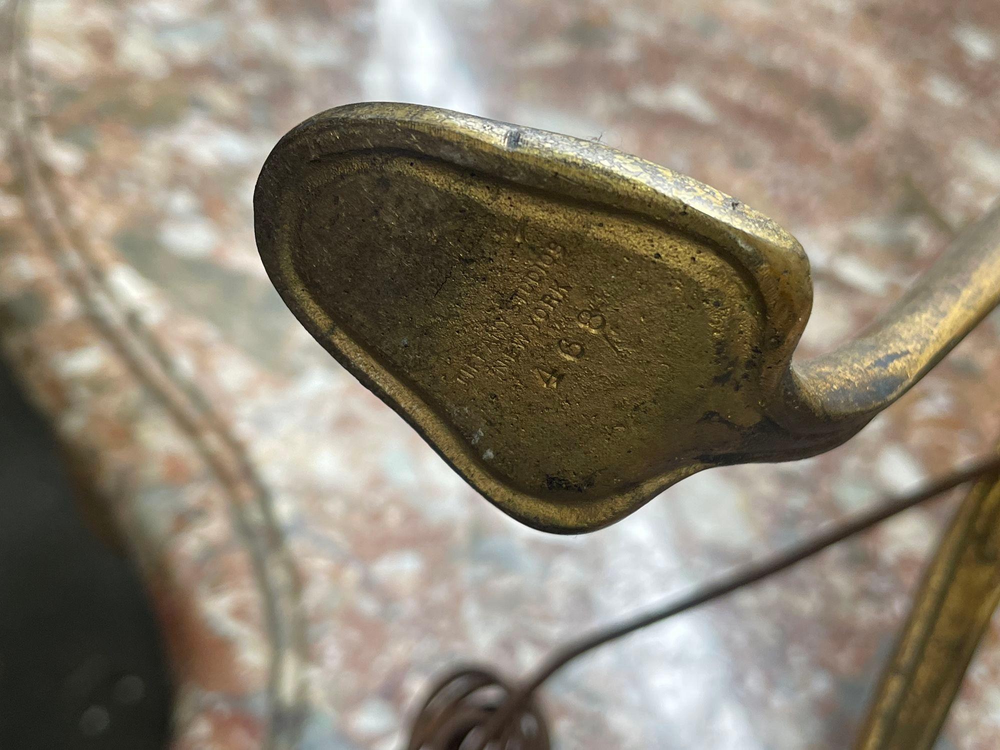 Tiffany Studios New York patinated bronze and Favrile glass floor lamp. Splayed legs with spade shaped feet.