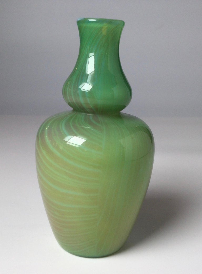 A rare signed Louis Comfort Tiffany favrille agate vase #5425n. Gourd shape in shades of soft green, Provenance Mr. and Mrs. George Schrim.