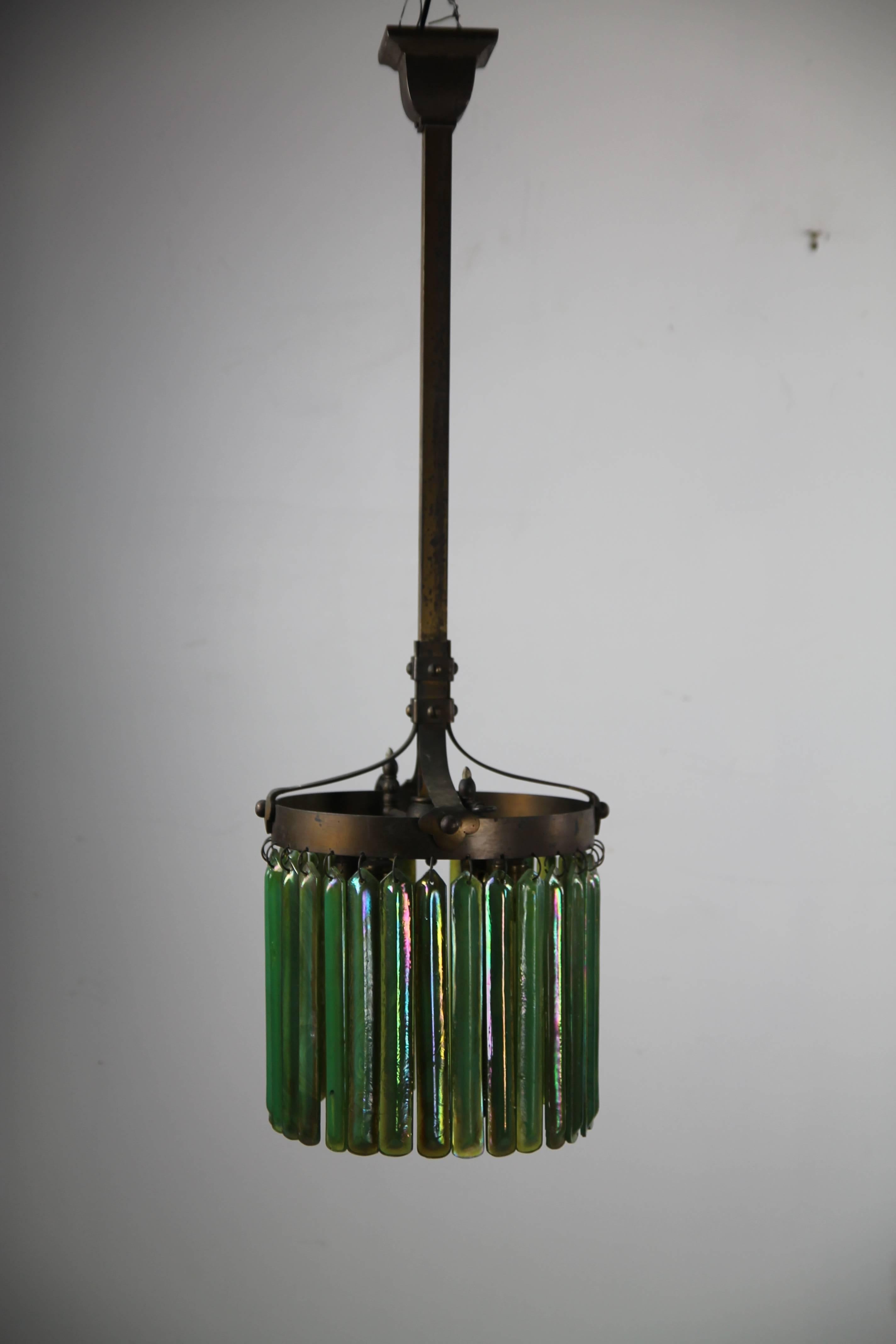 Wonderful Arts & Crafts period hanging light with 30 10 inch (rare) Tiffany Prisims, started its first life as a gas fixture which dates it circa 1895. Later it was converted to electric. This light came from a house in CT that had been decorated