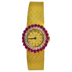 Tiffany & Co. Gold Double Bezel Watch with One Diamond Bezel and One Ruby Bezel
