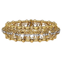 Pulsera Tiffany Hands en oro amarillo y platino