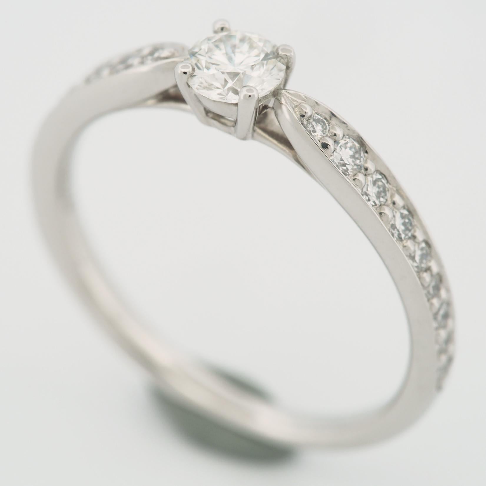 Item: Authentic Tiffany Harmony Solitaire Diamond Ring 
Stones: Diamond / 0.23ct (center stone) with 18 pave diamonds (approx. 0.11ct)
Color: H
Clarity:VVS1
Polish: Excellent
Symmetry: Excellent
Fluorescence: None
Metal: Platinum 950
Ring Size: SIZE
