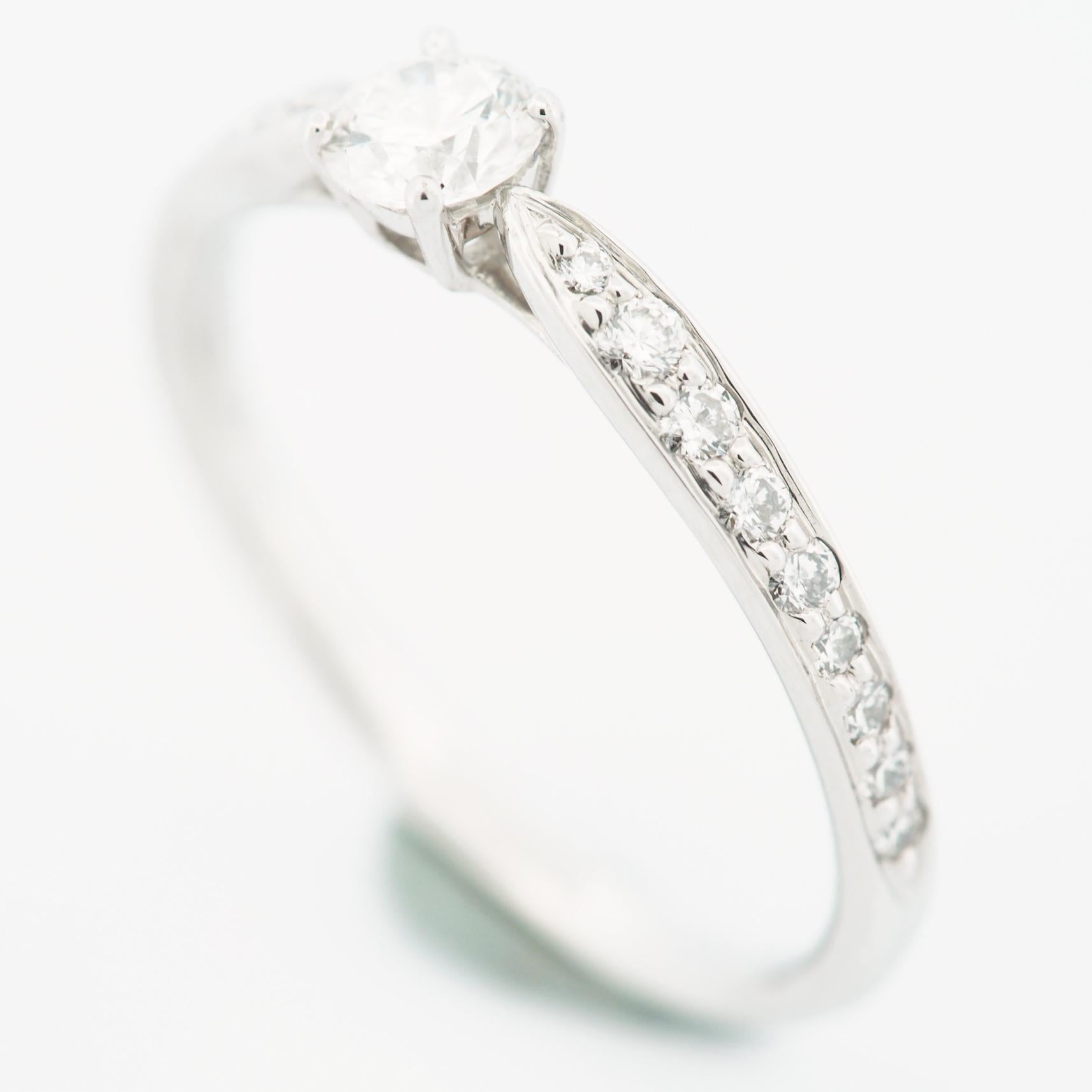 Round Cut Tiffany Harmony 0.23ct Solitaire Diamond Ring PT950 with 18 Pave Diamonds