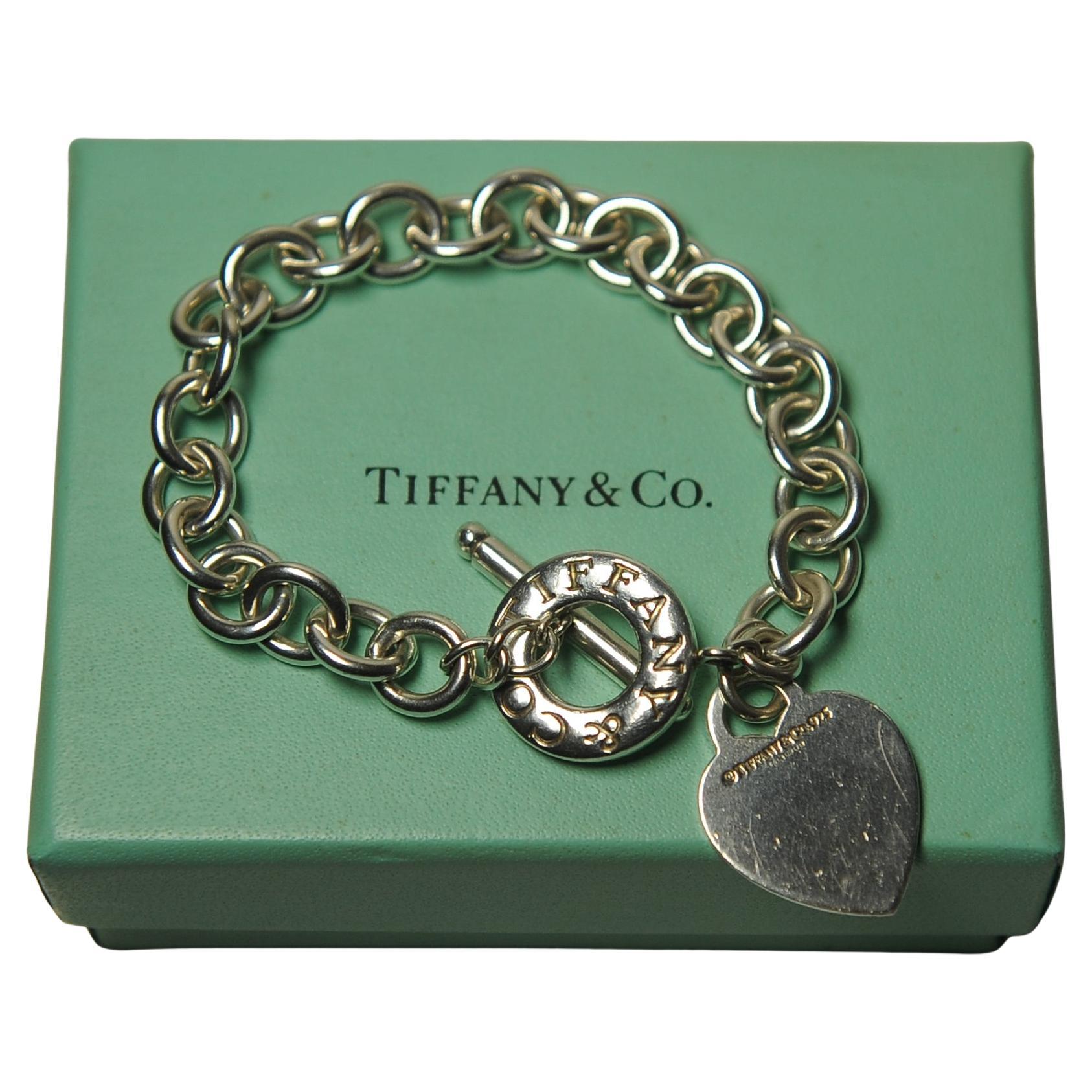 Tiffany Heart Bracelet Sterling Silver T Bar Stamped Tiffany & Co In Box

41g

