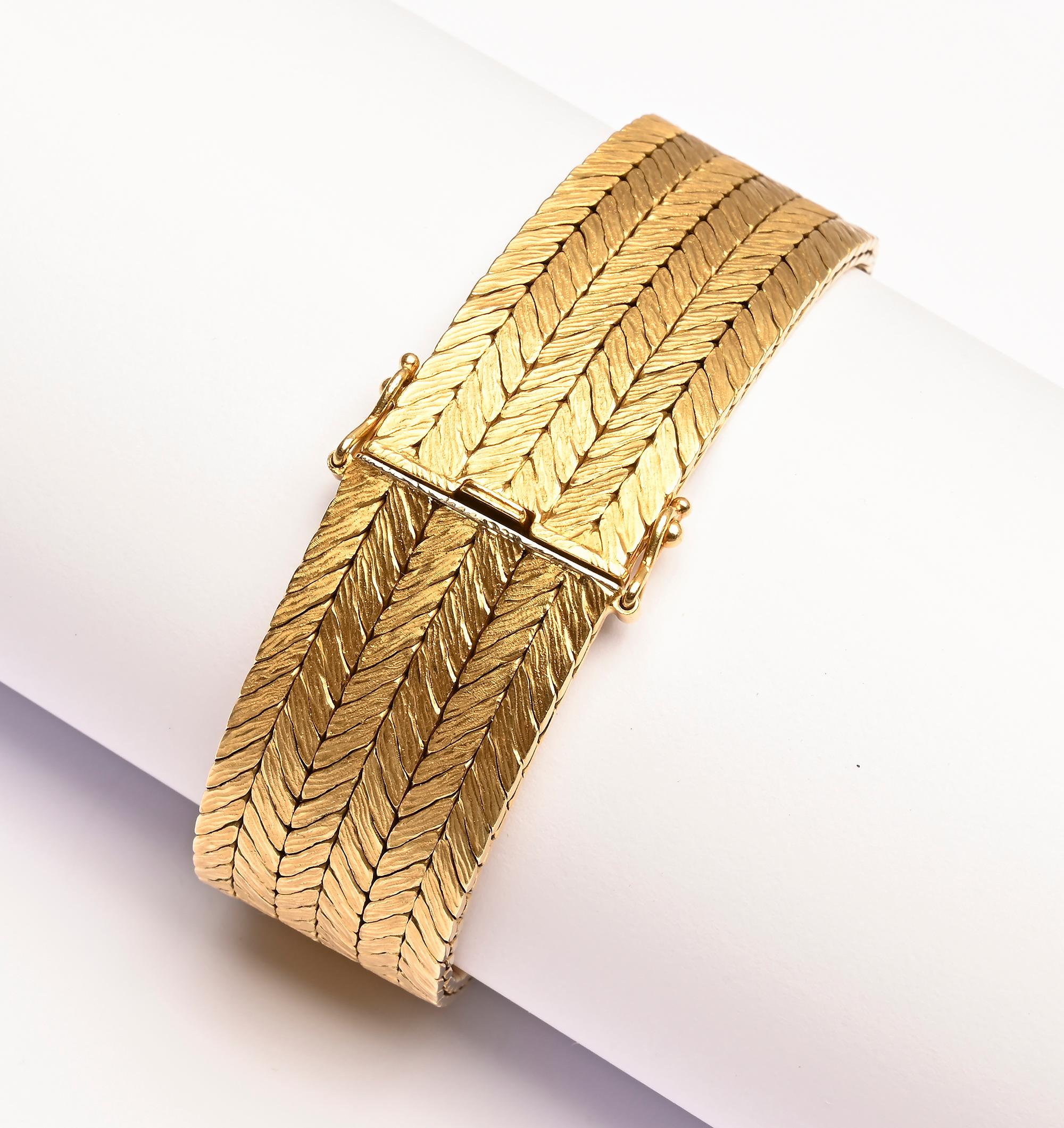 Exquisitely made, finely woven 18 karat gold bracelet by Tiffany. It was made in West Germany which existed as such from 1945 - 1990. The bracelet is tightly woven in six rows. It has a lightly brushed finish. The push clasp has two safety catches.