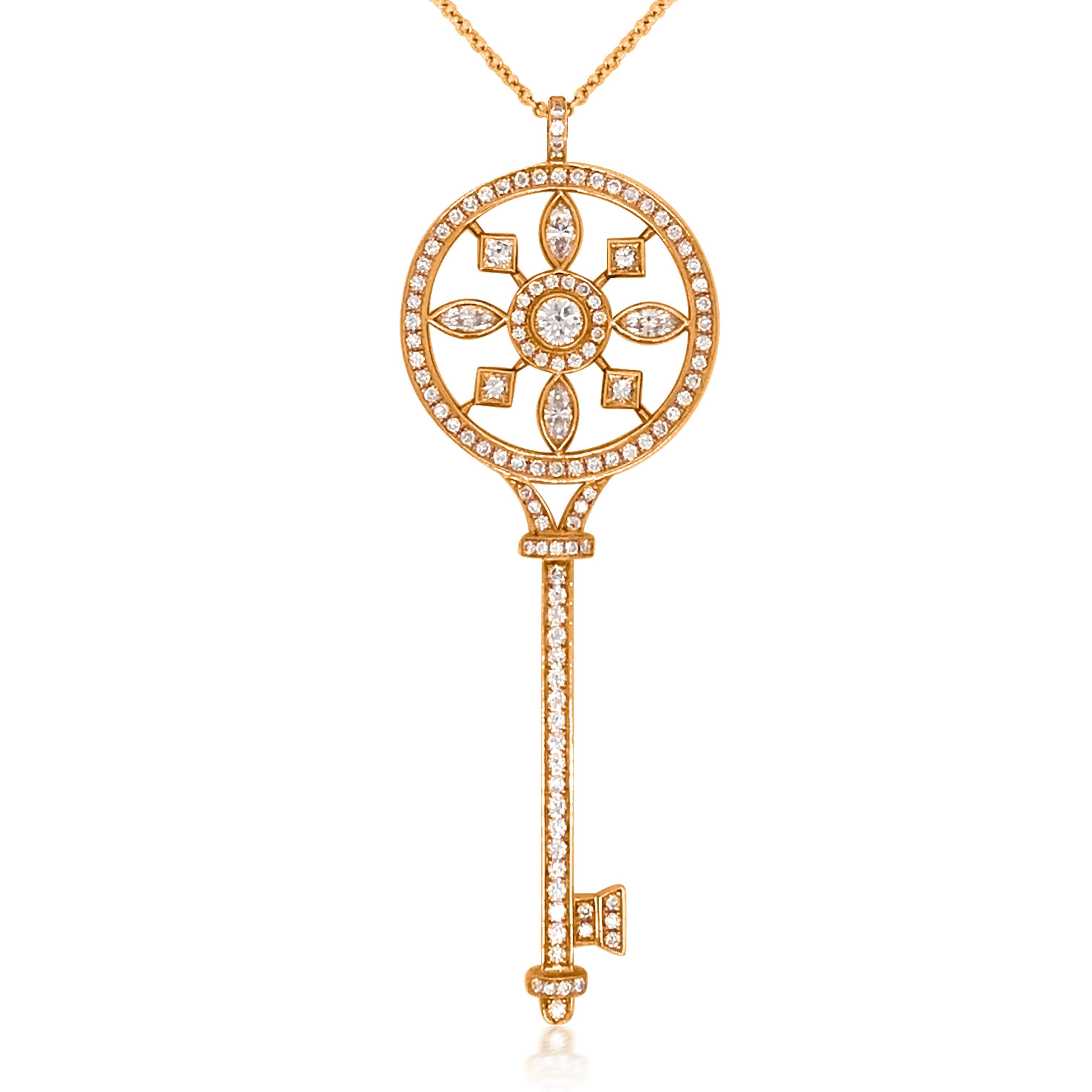 Brilliant beacons of optimism and hope, Tiffany Keys are radiant symbols of a bright future. This authentic Tiffany platinum key pendant glows with yellow diamonds, approx. 0.5ct, fancy light, illuminating the face. The necklace weighs 9.62 grams