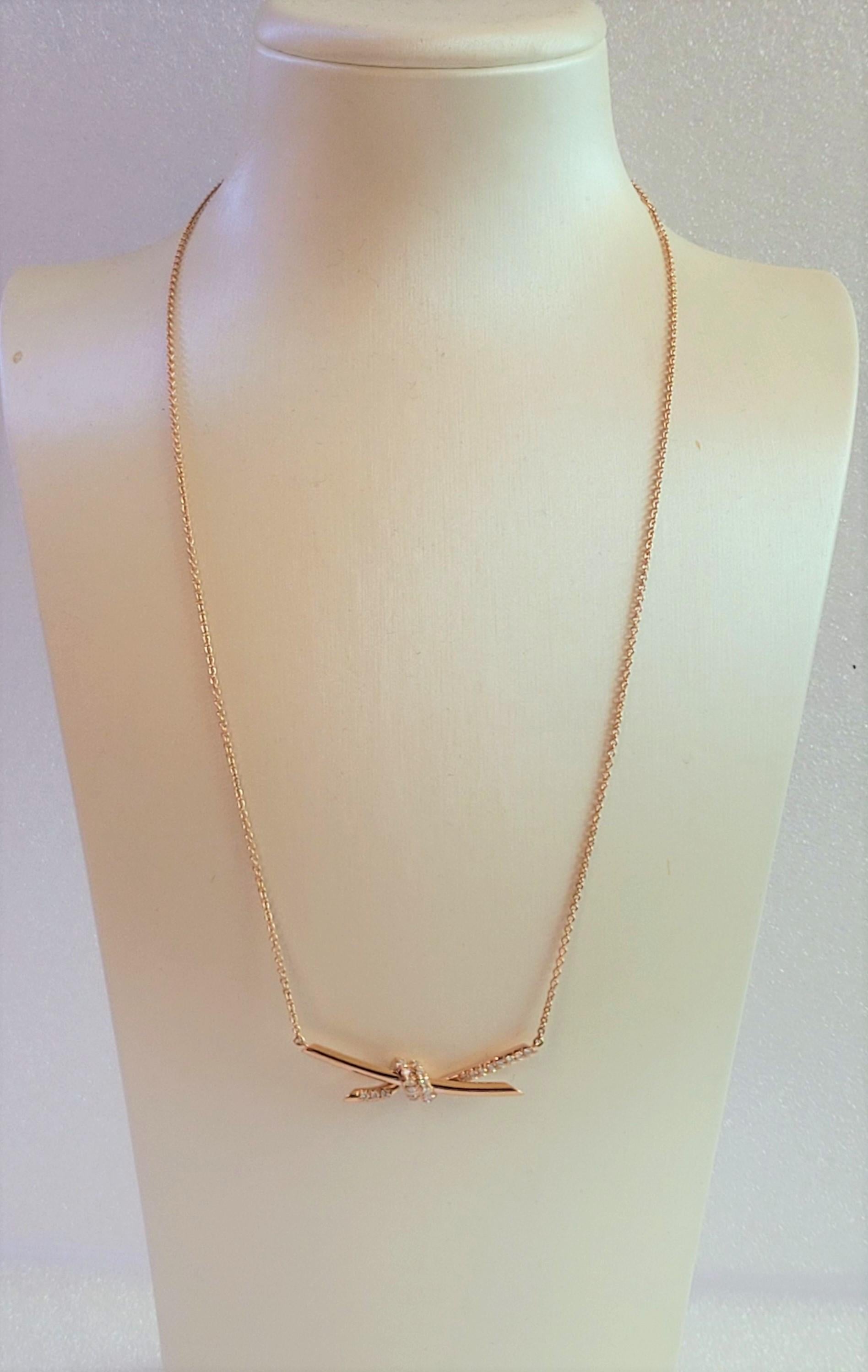 Brand Tiffany & co 
18K Rose Gold with round diamonds
Carat total weight .25
Diamond Clarity VS1
Color Grade F-G
Chain length 17'' Long
Adjustable chain 15-17'' Long 
Weight 5.6gr
Condition New, never worn
Comes with Tiffany & co pendant box.