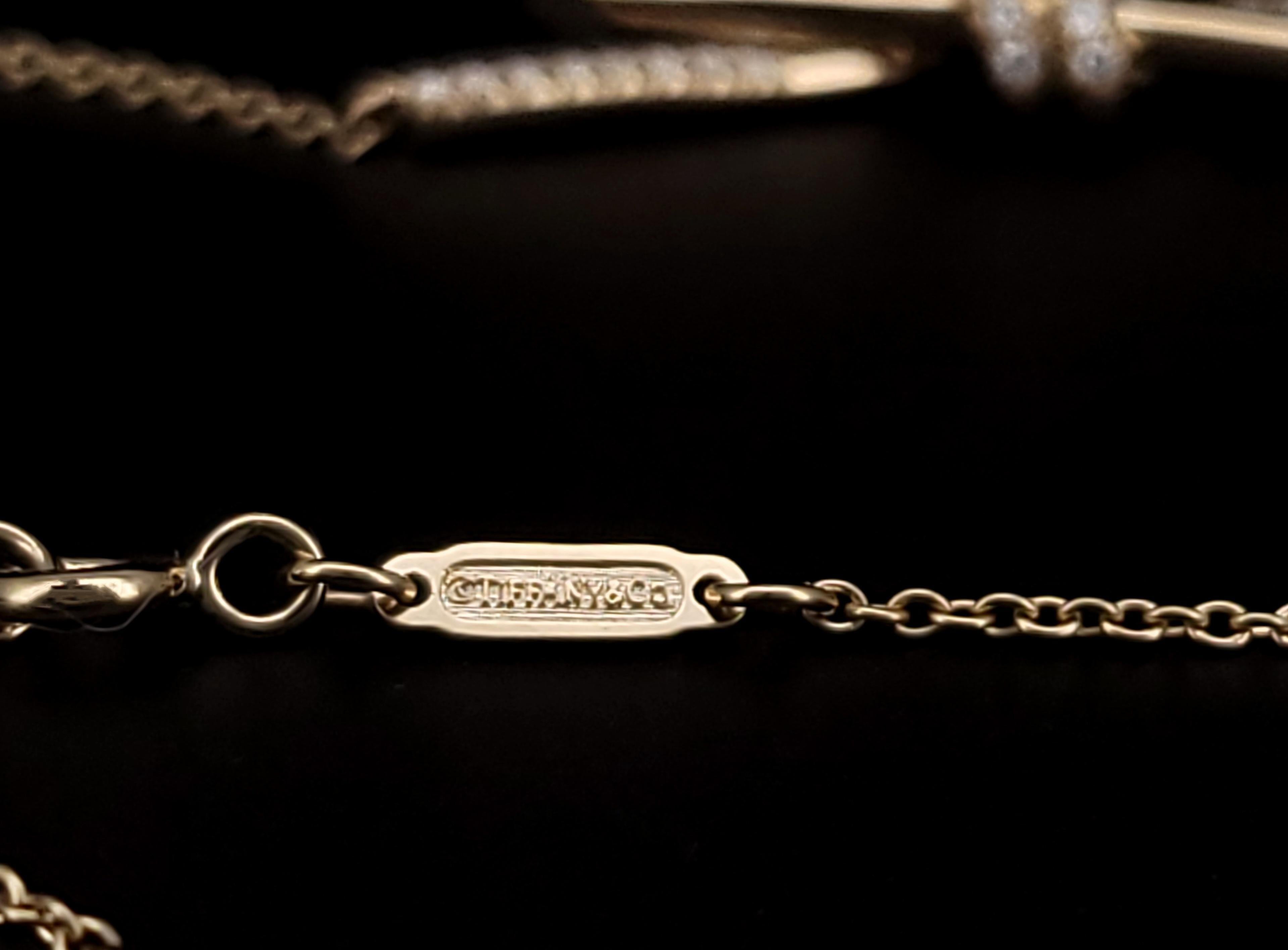 Tiffany Knot Pendant in Yellow Gold with Diamonds 1