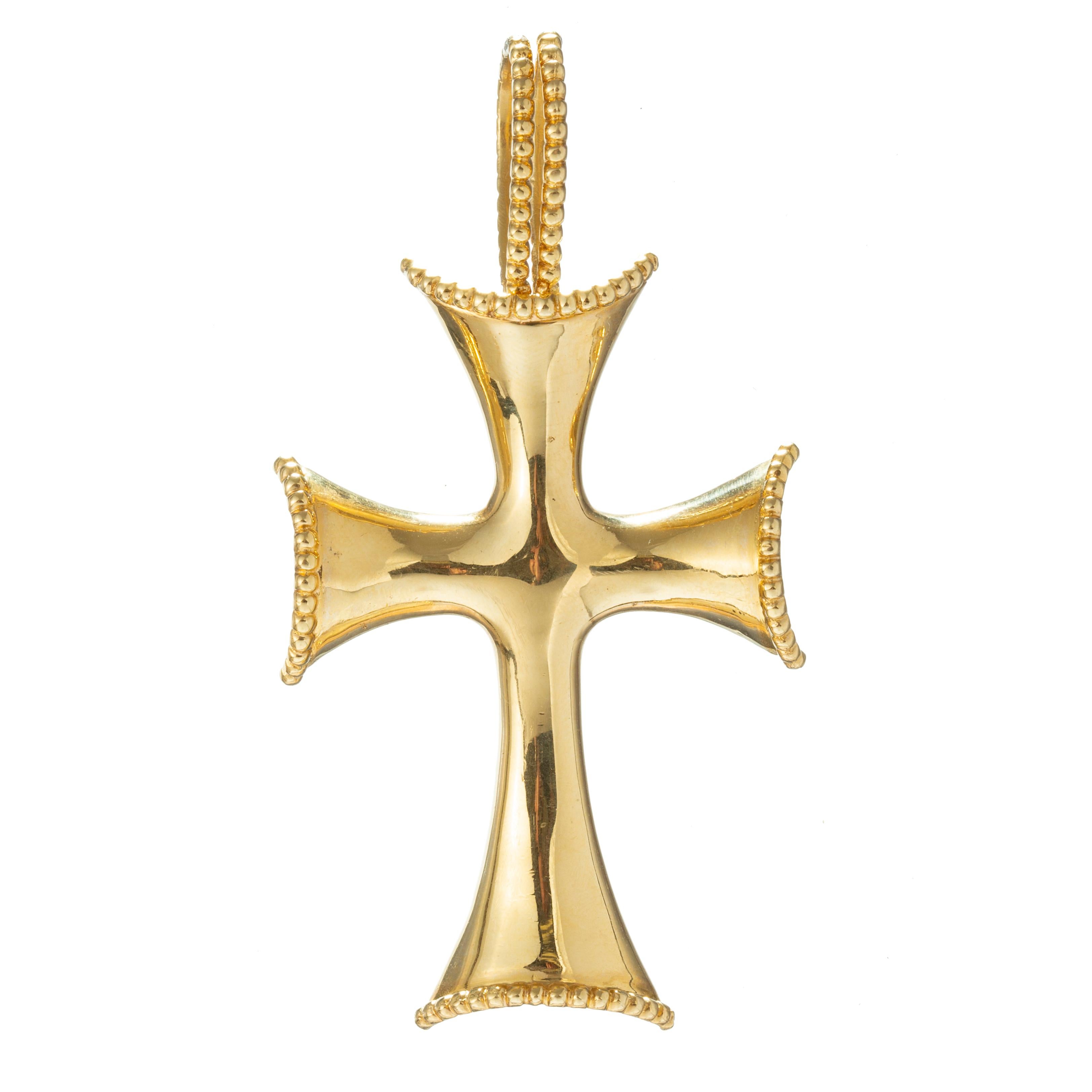 Tiffany & Co. 18k yellow gold cross pendant measuring 3.5