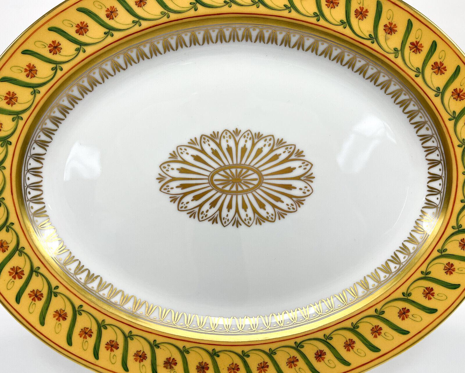 Tiffany Le Tallec Private stock porcelain oval serving tray in Directoir

A yellow ground with hand painted flowers and leaves throughout. Gilt florals to the center. Tiffany & Co. Private stock marks to the underside.

Additional