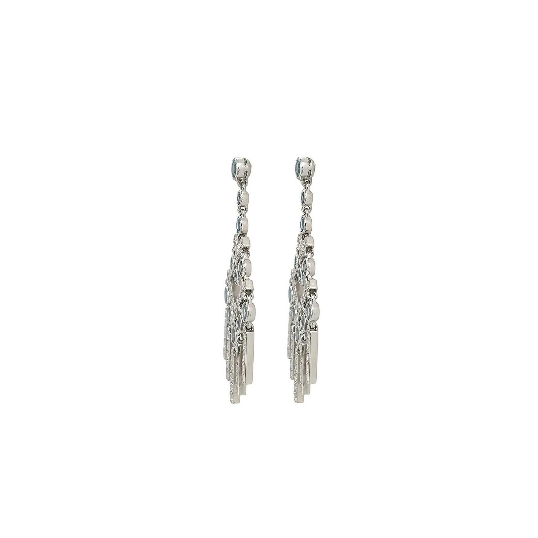 A pair of platinum, aquamarine and diamond earrings, Tiffany & Co. Each earring, from the 