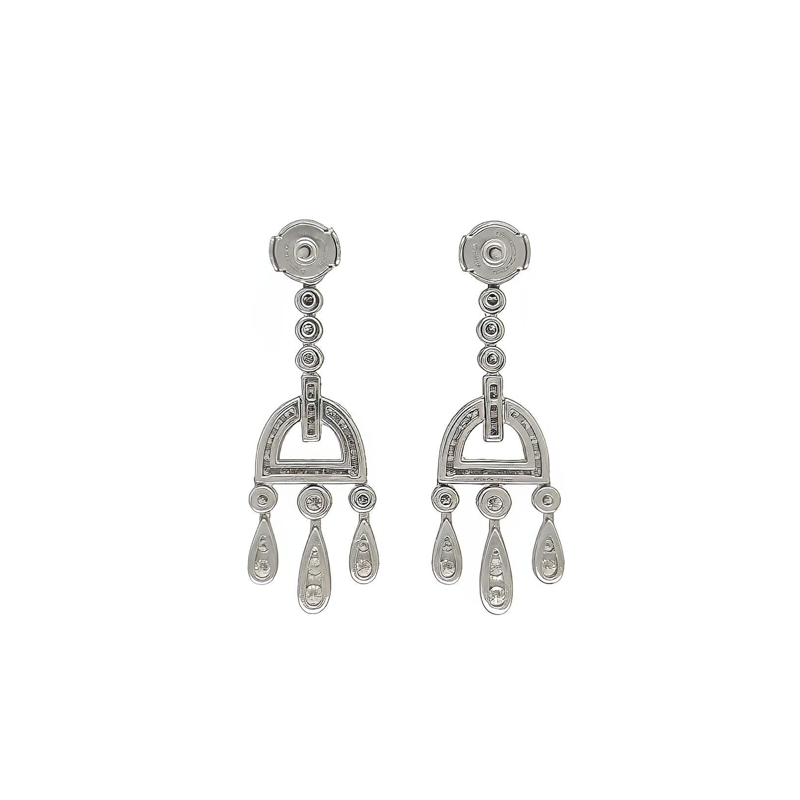 A pair of platinum and diamond earrings, Tiffany & Co.  Each earring, from the 