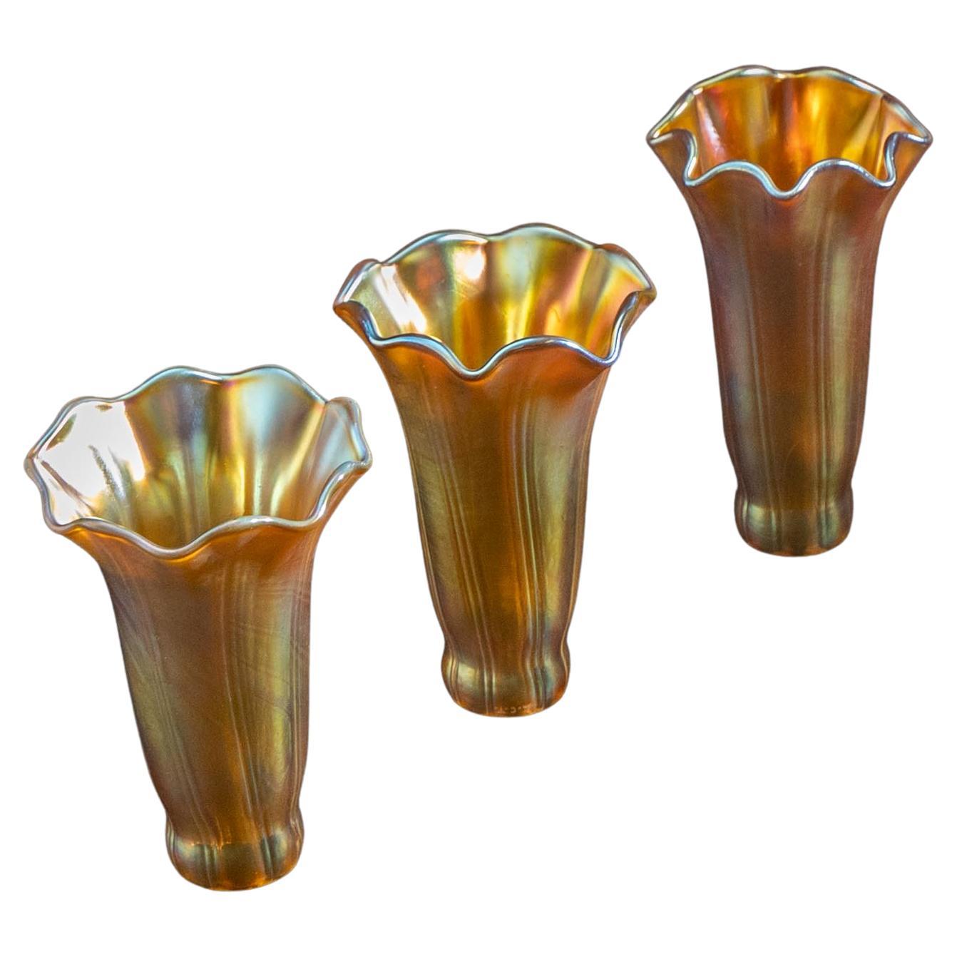 Three Tiffany Lily Lampshades, Glass, original replacement parts, circa 1900 For Sale