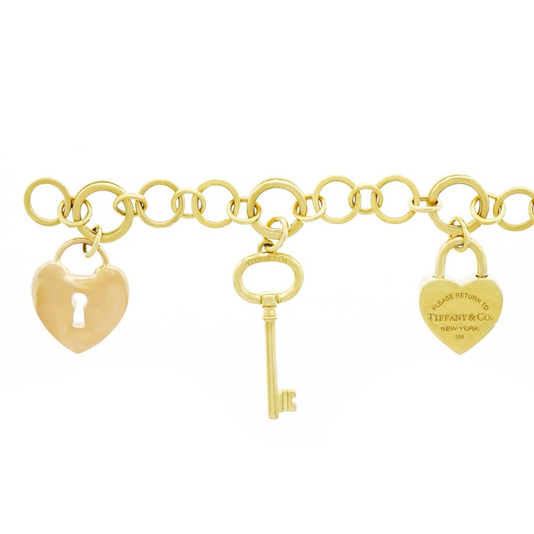 Tiffany Lock and Key Gold Charm Bracelet at 1stDibs tiffany lock and key bracelet, tiffany