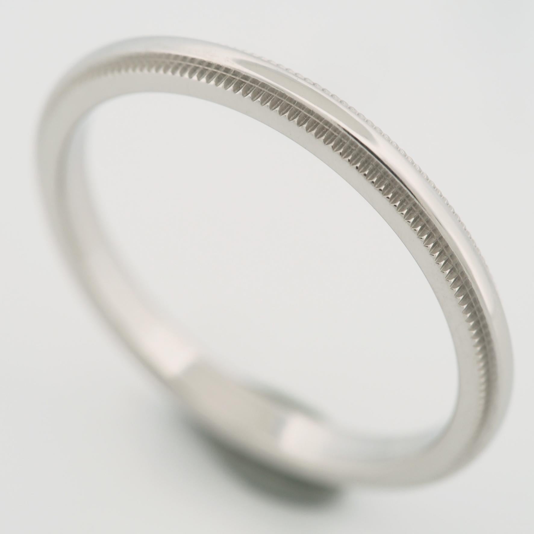 Item: Authentic Tiffany & Co Together Milgrain Wedding Band Ring
Stones: ---
Metal: Platinum 950
Ring Size: US SIZE 7.25 UK SIZE O
Internal Diameter: 17.55 mm
Measurement: 2.2 mm Width
Weight: 3.9 Grams
Condition: Used (repolished)
Retail Price: