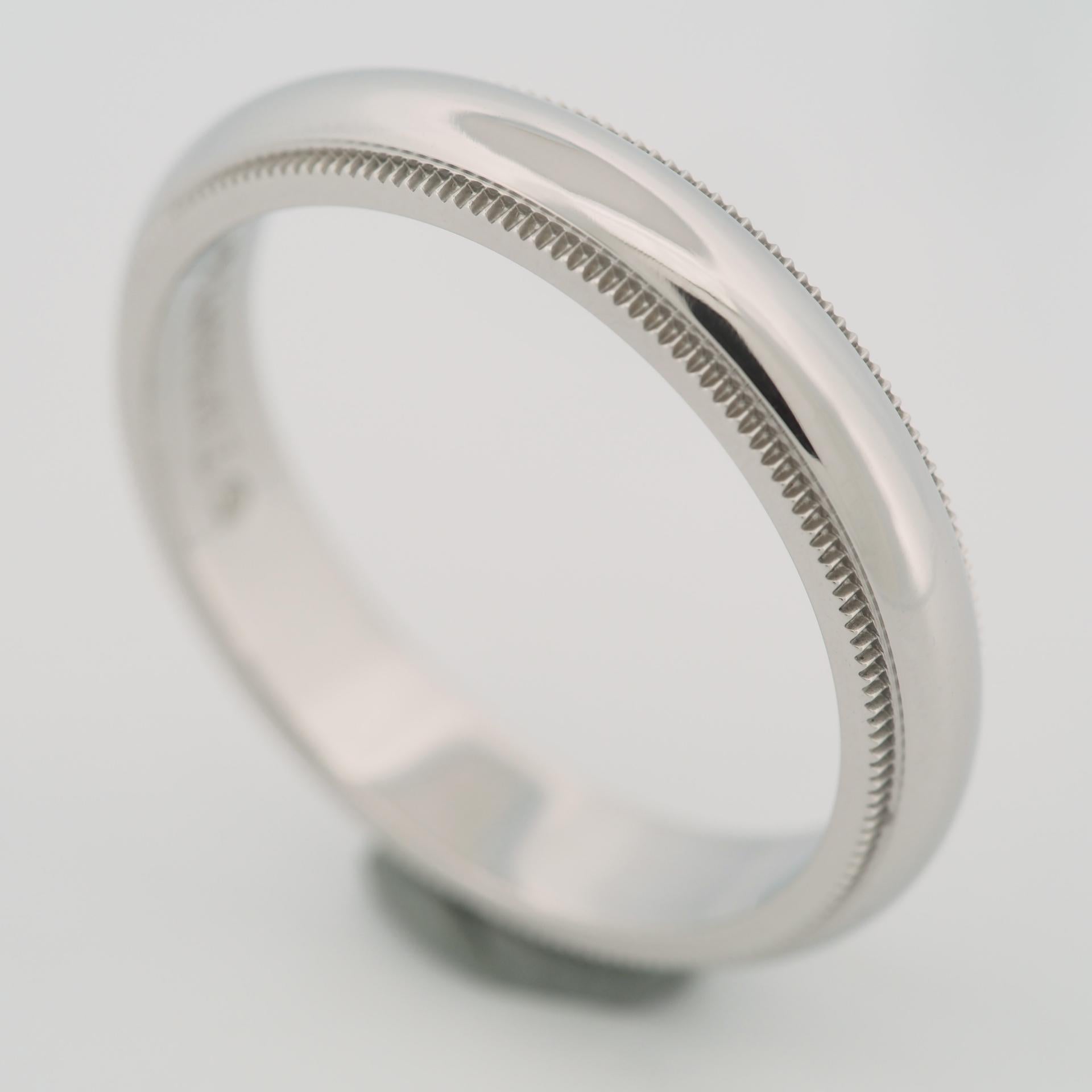 Item: Authentic Tiffany & Co Together Milgrain Wedding Band Ring
Stones: ---
Metal: Platinum 950
Ring Size: US SIZE 8.25 UK SIZE Q
Internal Diameter: 18.30 mm
Measurement: 4.0 mm Wide
Weight: 8.2 Grams
Condition: Used (repolished)
Retail Price: