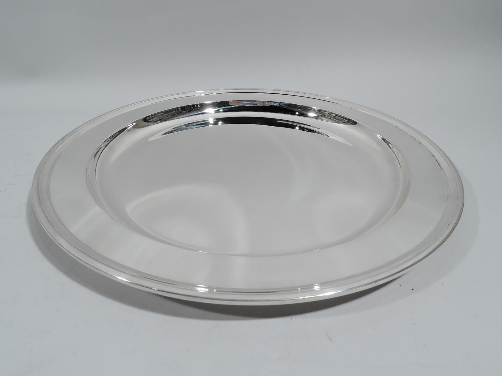 Modern sterling silver tray. Made by Tiffany & Co. in New York, ca 1923. Deep well and wide shoulder. Fully marked including pattern no. 20188 (first produced in 1923) and director's letter m. Heavy weight: 27.5 troy ounces.