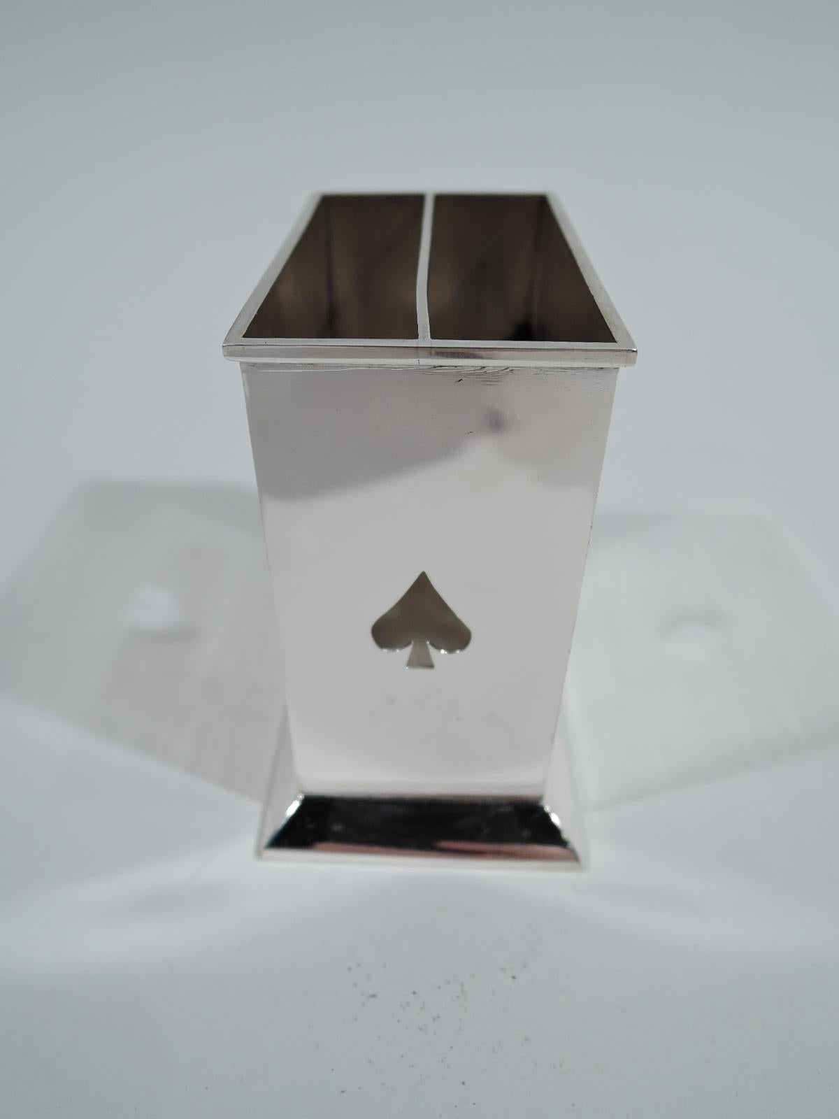 Modern sterling silver playing cards box. Retailed by Tiffany & Co. in New York. Rectangular with pierced suit symbols; central partition and spread base. Marked “Tiffany & Co. 925 Sterling Italy”. Weight: 3.5 troy ounces.