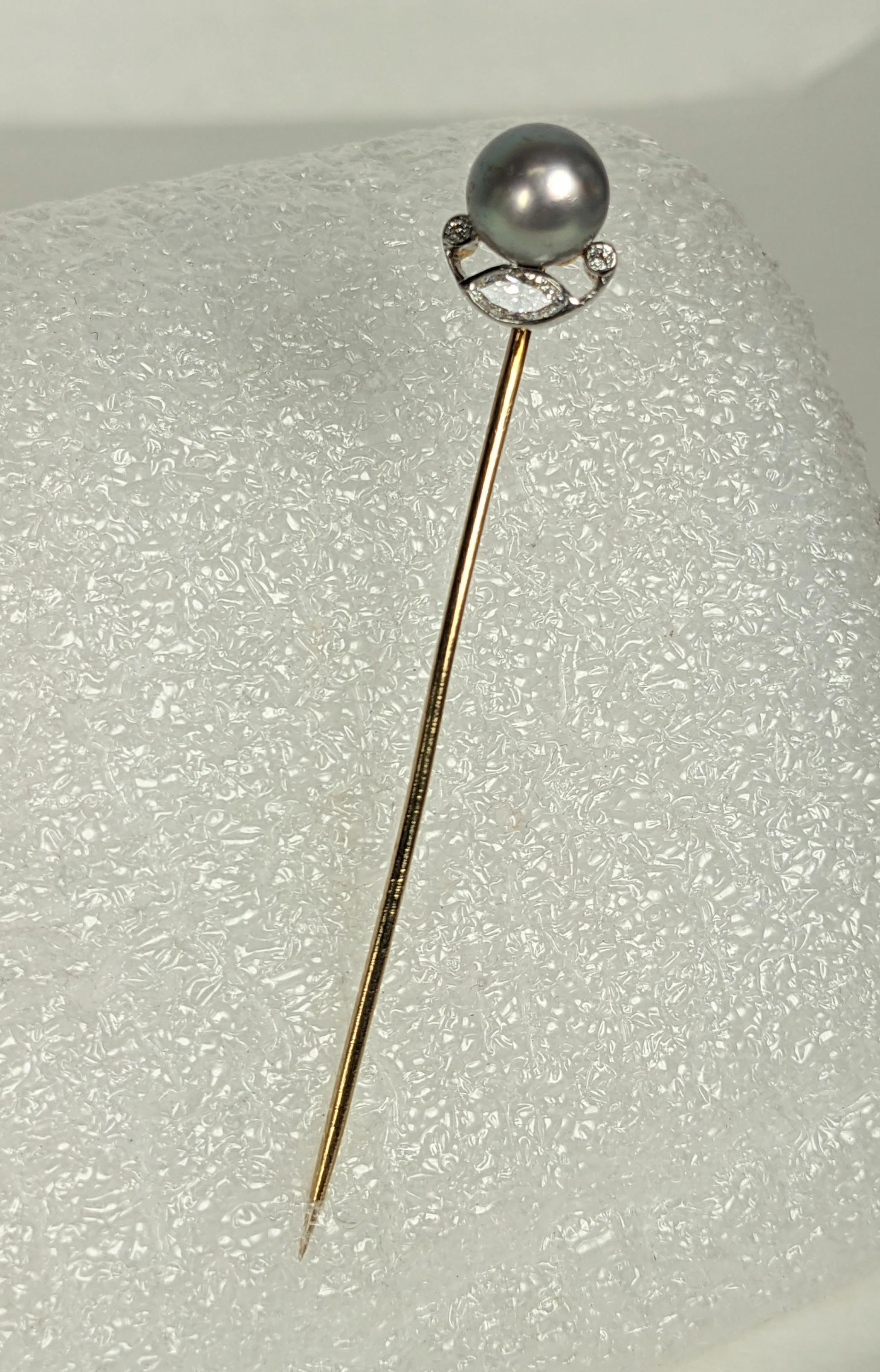 Edwardian Tiffany Natural Grey Pearl and Marquise Diamond Stick Pin from the early 20th Century. Large 9mm grey natural pearl set with a marquise 40 point diamond and 2 smaller diamond accents in the filigree. 2 5/8