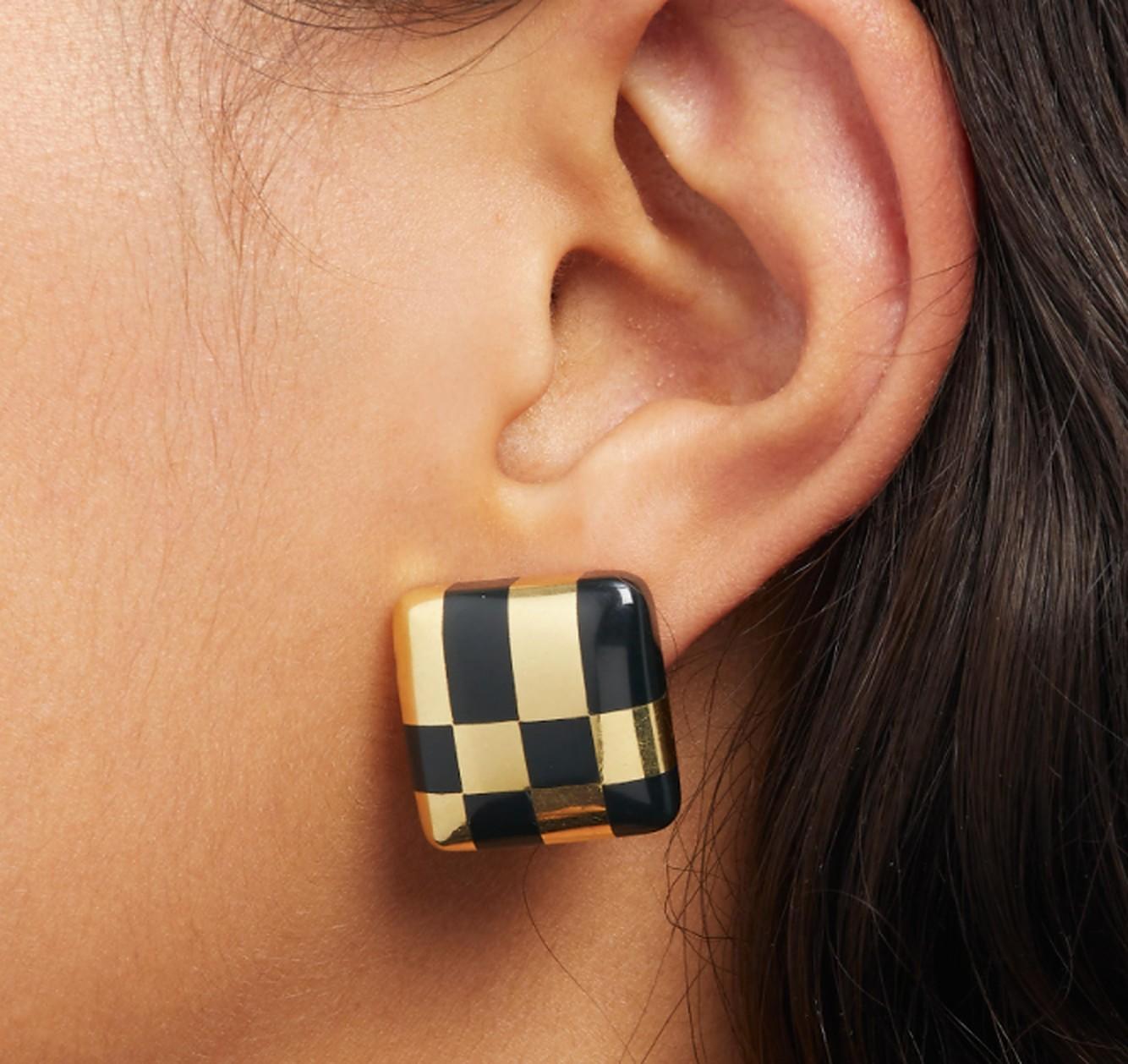 An elegant pair of Tiffany Earrings crafted in 18k Yellow Gold with Onyx Geometric Design. Made in America, circa 1982.