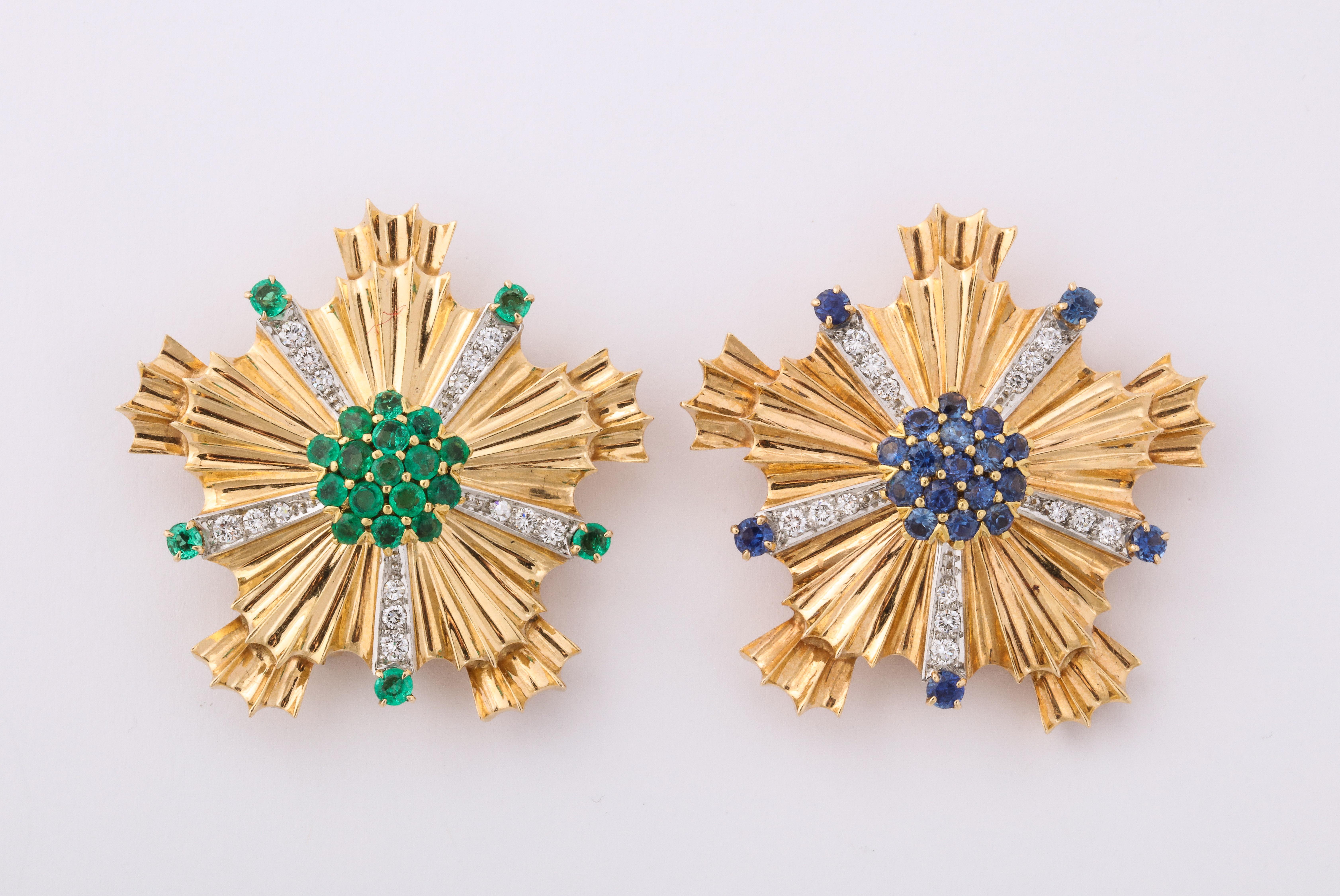 Tiffany Pair of Sapphire Emerald Diamond Gold brooches. 14K Yellow Gold, 21 single cut blue sapphires, 21 single cut emeralds, 40 fine white full cut diamonds. Marked Tiffany & Co.  Circa 1950. 

Materials:  
14K Yellow Gold.  44 grams.

Stones: 
21