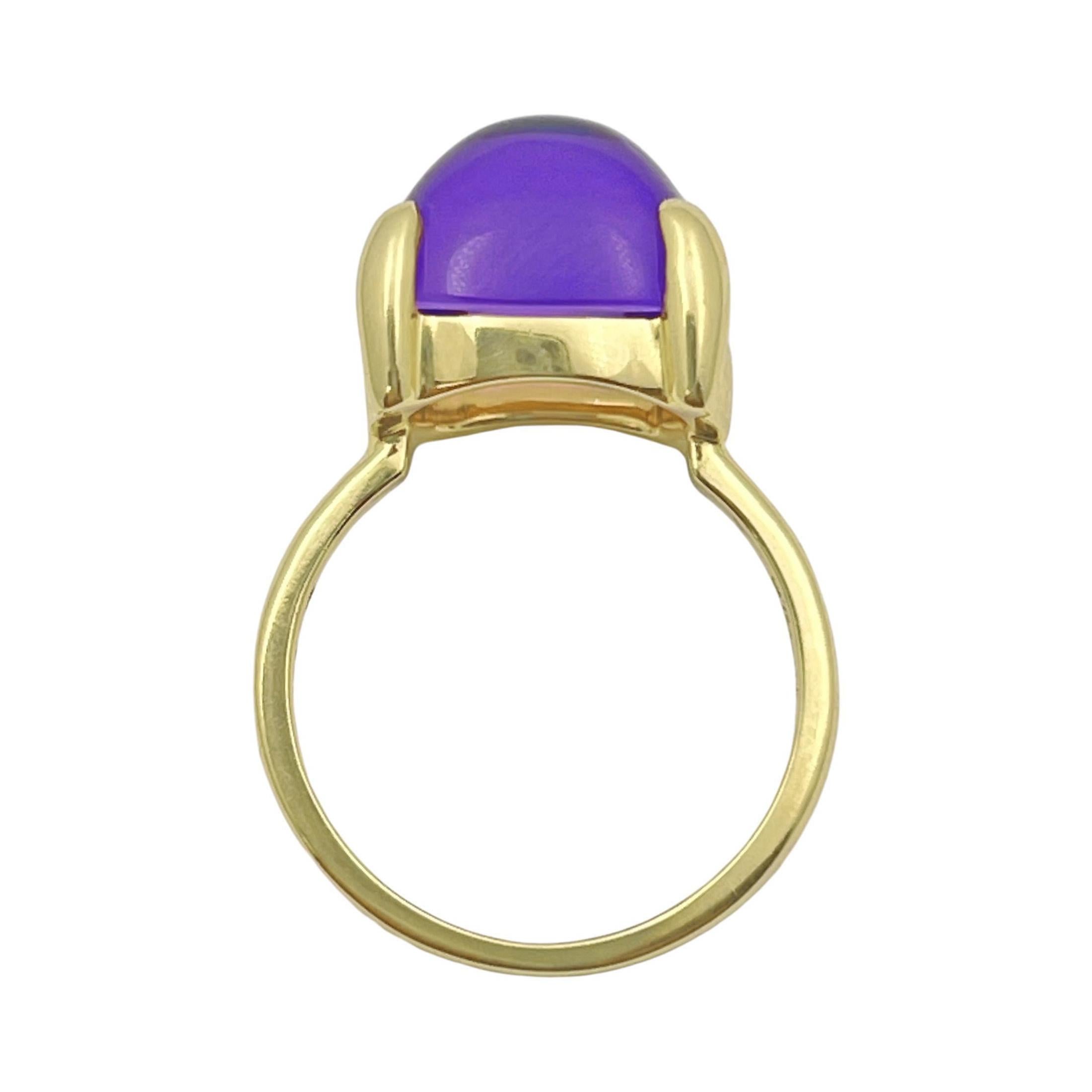 Designed by Paloma Picasso for Tiffany & Co. from the Sugar Stack collection in 18k yellow gold and amethyst.  This is the large-sized version featuring a sugarloaf cabochon-cut natural amethyst measuring 12 x 12mm and weighing approximately 9.40