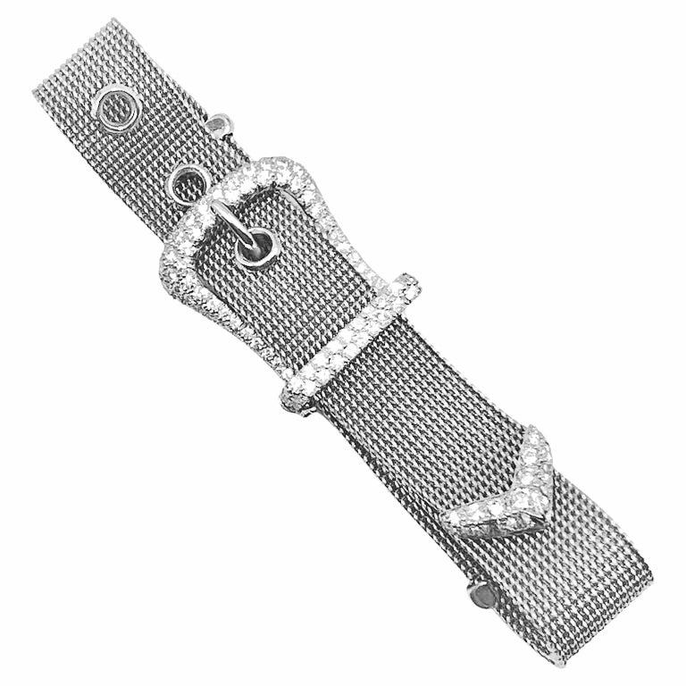 Tiffany bracelet in platinum mesh with two spacer-style bars, buckle and 'V' tip end section each bead and pave-set with round brilliant-cut diamonds.  154 diamonds weighing ~2.65 total carats (F-G color, VVS-VS clarity).  Fold-over safety latch