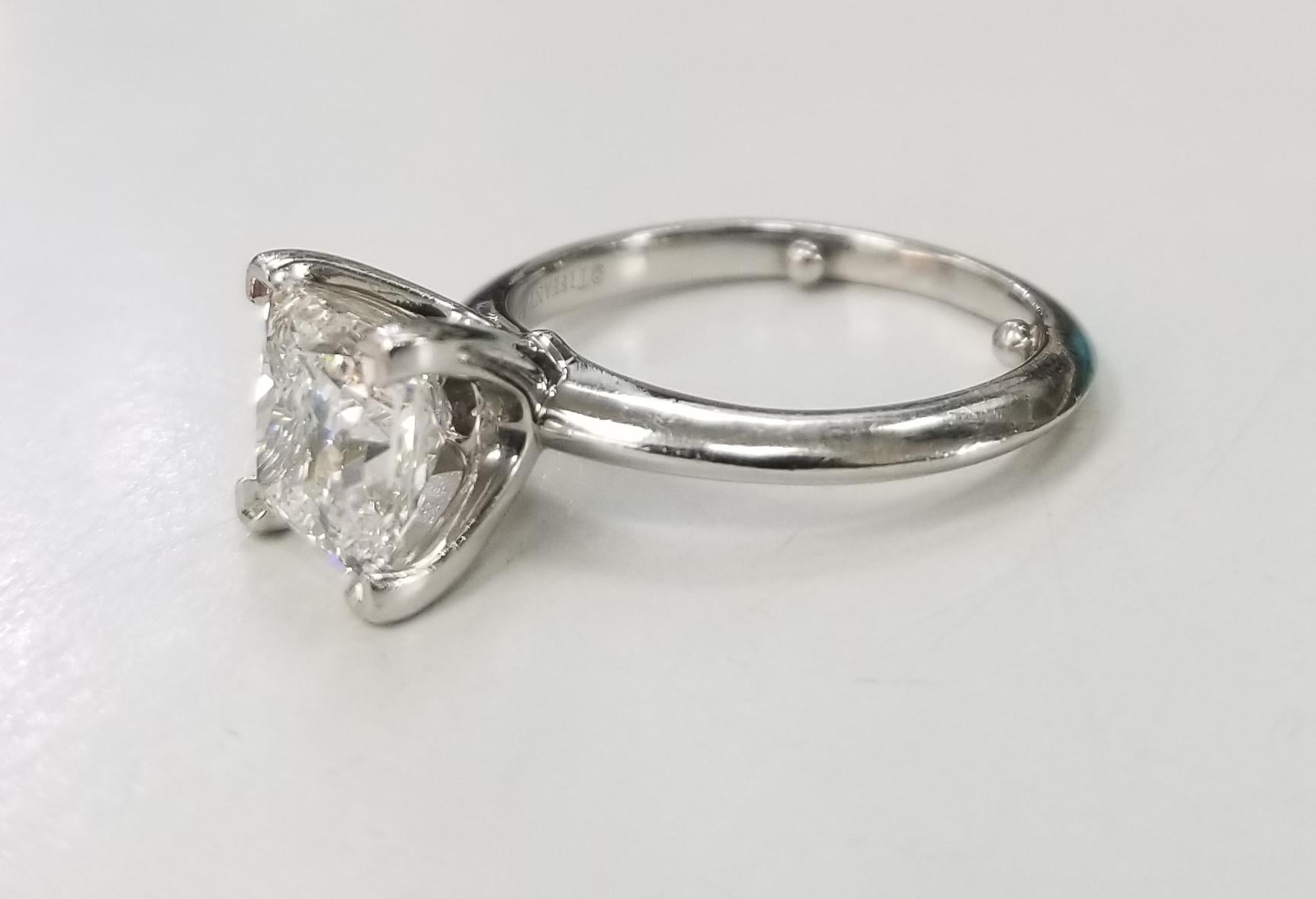 Tiffany Platinum Princess cut diamond classic knife edge ring, with 1 princess cut diamond; color 