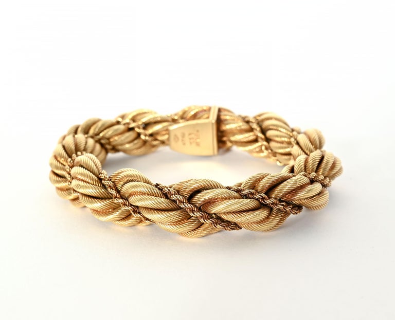 Classic rope twist bracelet by Tiffany with a wider than usual circumference. It measures 1 3/4 inches in circumference and 7 7/8 inches in length. A narrow rope intertwines around the larger one. This bracelet makes a statement on its own or can be