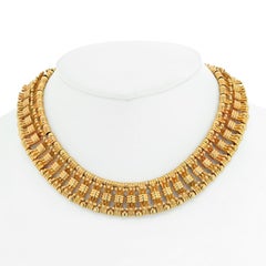 Tiffany, Schlumberger Collar de eslabones con pajarita de oro amarillo de 18 quilates