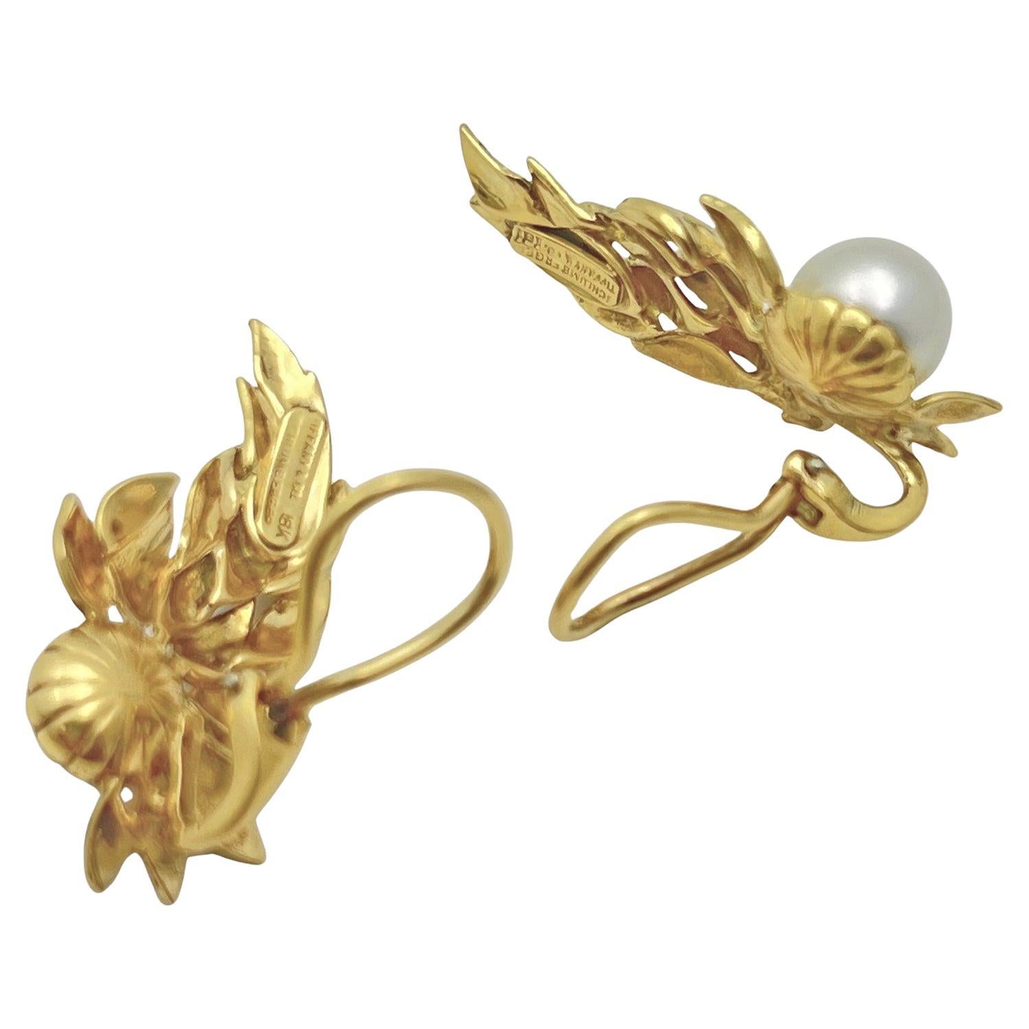 Jean Schlumberger for Tiffany & Co. wing motif earrings, crafted in 18k yellow gold and set with cultured pearls. Pearls measuring 9mm in diameter. Signed “18k Tiffany & Co. Schlumberger
