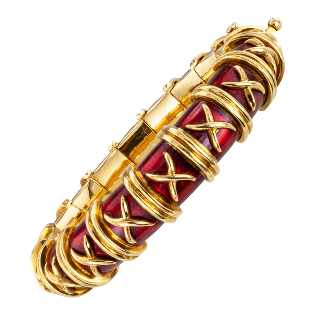 Tiffany Schlumberger Croisillon red enamel yellow gold bangle bracelet circa 1970.  Love it because it caught your eye, and we are here to connect you with beautiful and affordable jewelry.  Decorate Yourself!  Simple and concise information you