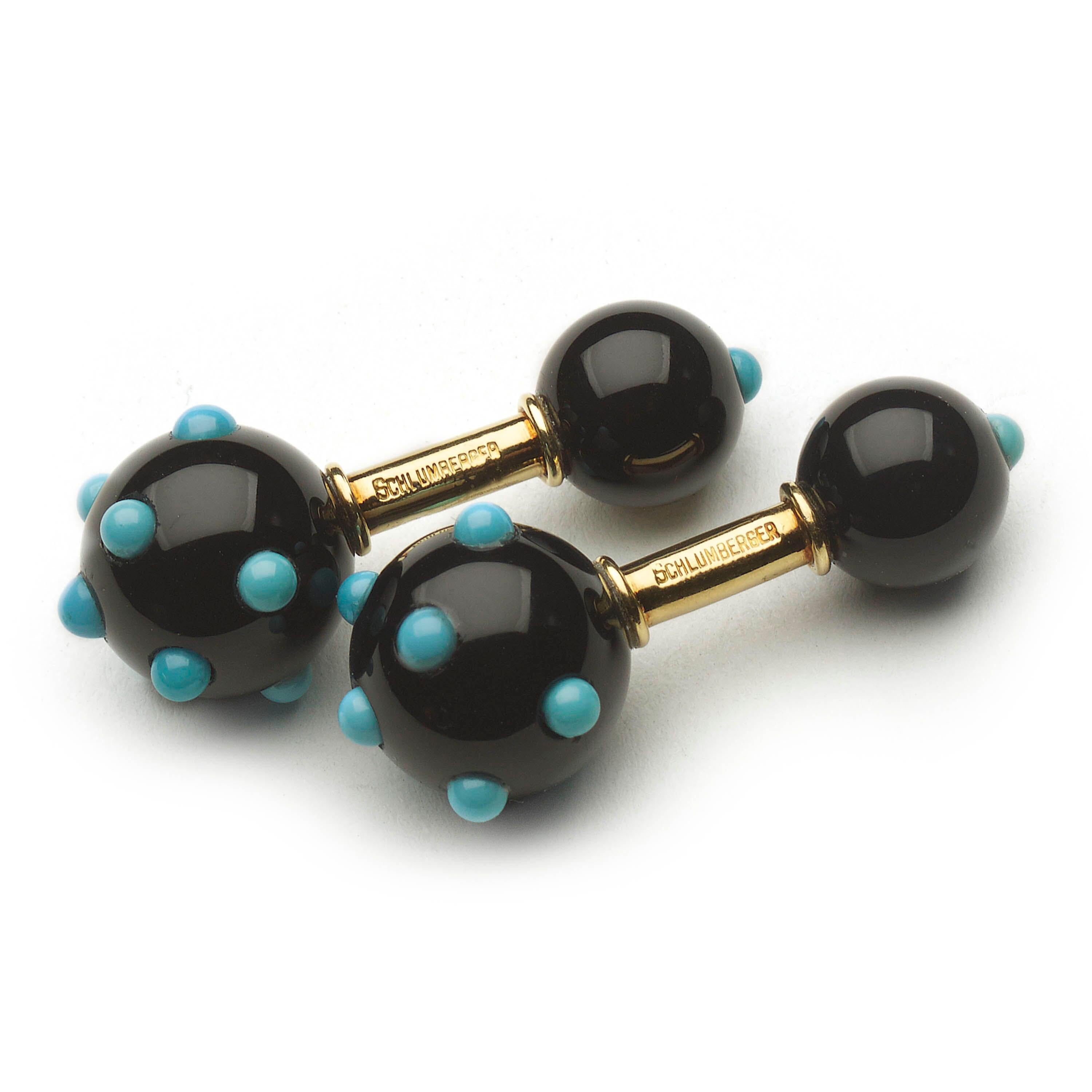 A pair of Jean Schlumberger for Tiffany & Co. black onyx and turquoise cufflinks, with turquoise studded black onyx spheres, on 18ct gold, signed Schlumberger and Tiffany & Co., stamped 18K, circa 1960.