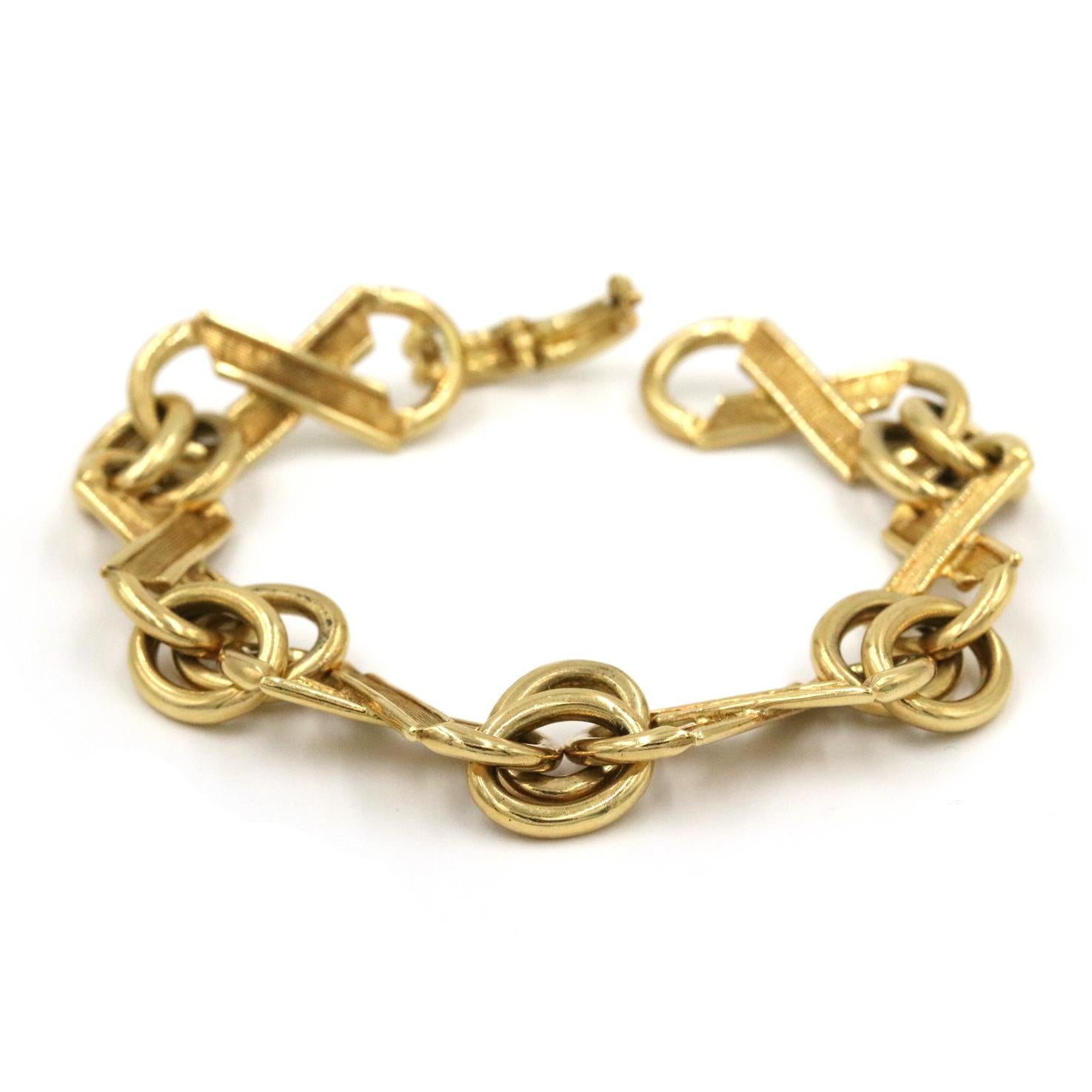 Tiffany Schlumberger Fancy Link Bracelet In 18K Yellow Gold. This Bracelet Has X Shaped Textured Gold Links And Gold Double Ring Links. 