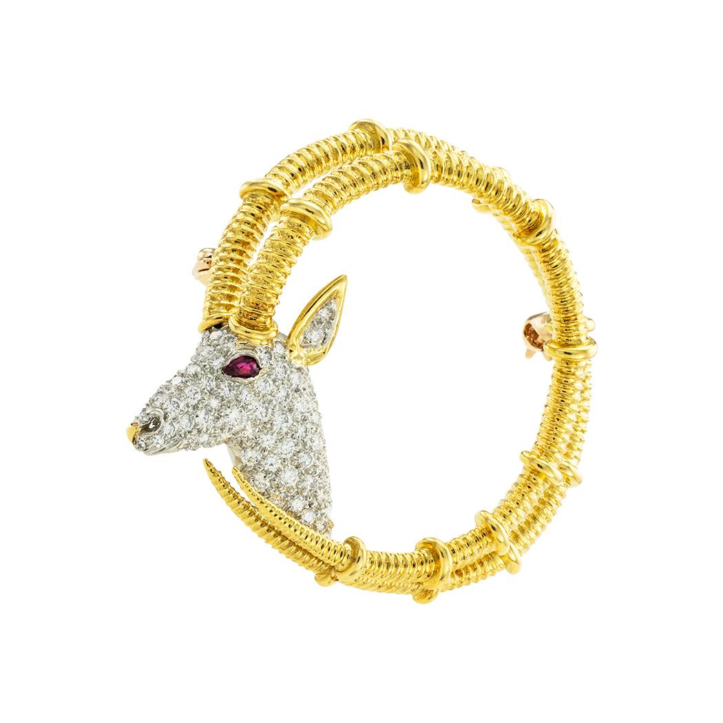 Tiffany & Co Schlumberger diamond and ruby yellow gold and platinum Ibex brooch circa 1980. *

ABOUT THIS ITEM:  #P-DJ816C.  Scroll down for detailed specifications. The Ibex brooch is one of the many instantly recognizable and iconic designs Jean