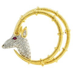 Tiffany Schlumberger Broche Ibex en or jaune, diamants, rubis et platine