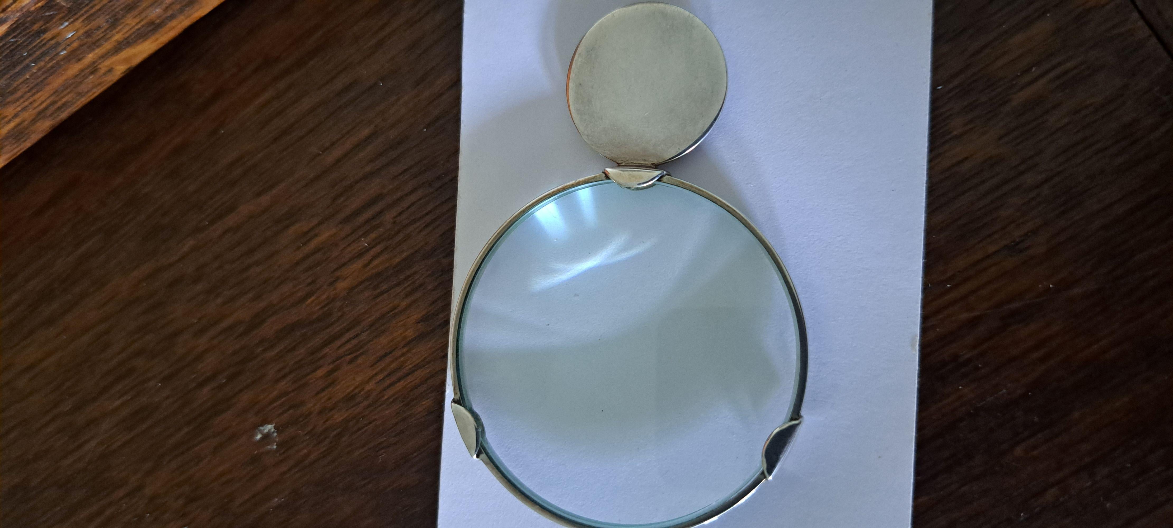 Tiffany silver loupe  magnifying glass 
 A tiffany sterling silver loupe magnifying glass 
Hallmarks and makers marks  are present and clear. 
This magnifier is in good used condition, 
There are  some small scratches to the silver and signs of