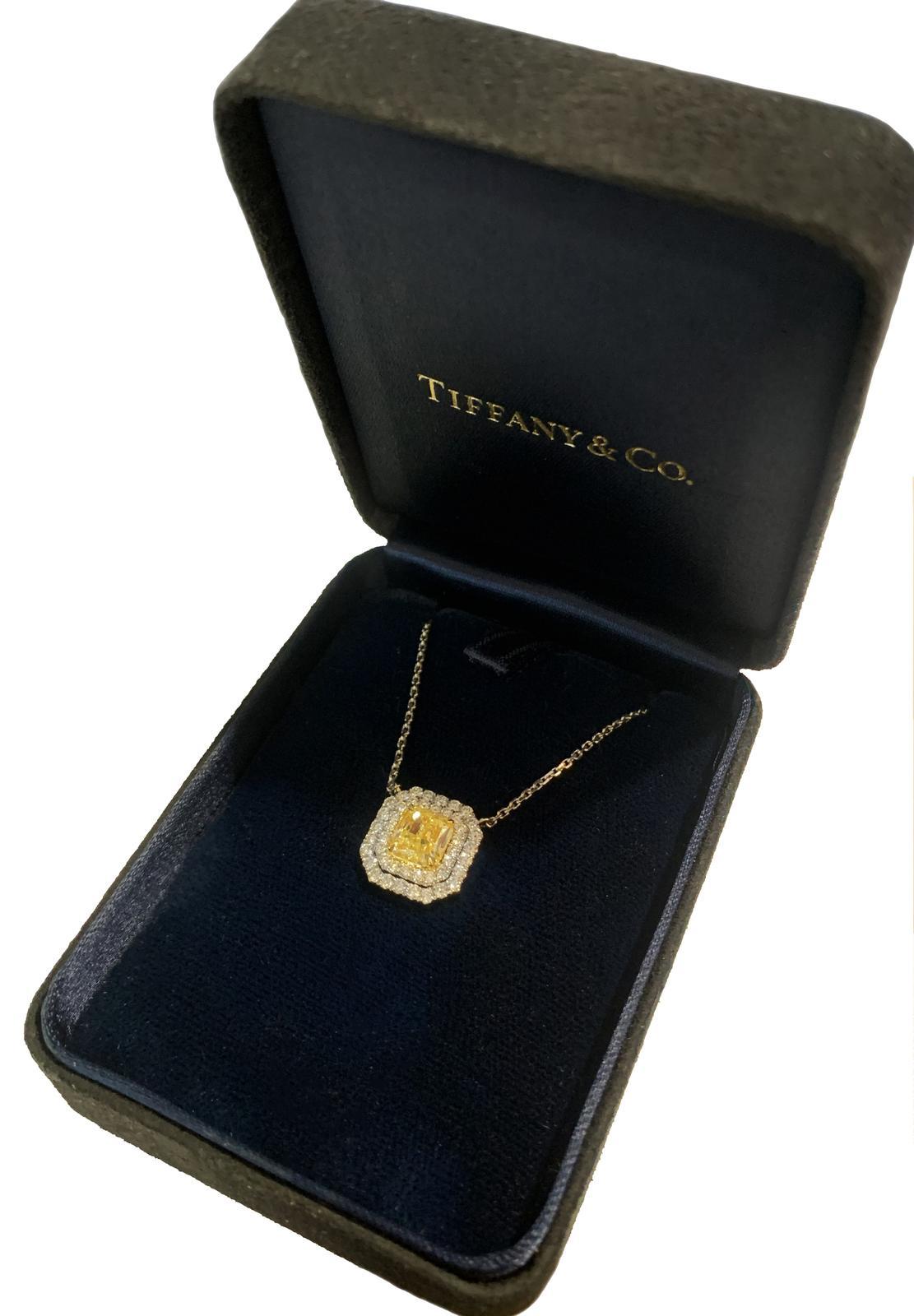 -Mint condition
-Platinum
-Length: 16”
-Pendant dimension: 12x12mm
-Center Fancy Yellow Diamond: 0.87ct, Cushion Modified Cut
-Diamonds: 0.76ct, VS clarity, E-F color
-Retail: $22,000