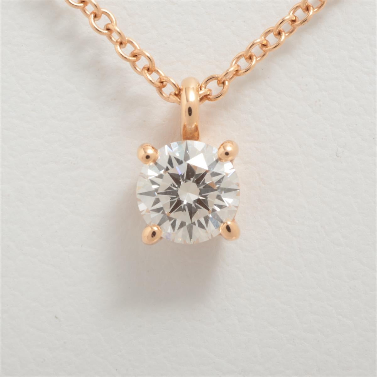 Brand : Tiffany&Co. 
Description: Tiffany Solitaire Diamond Necklace 
Metal Type: 750PG/Yellow Gold
Total Weight:  1.8g
Condition: Preowned; small signs of wearing
Box -    Included
Papers -  Included

