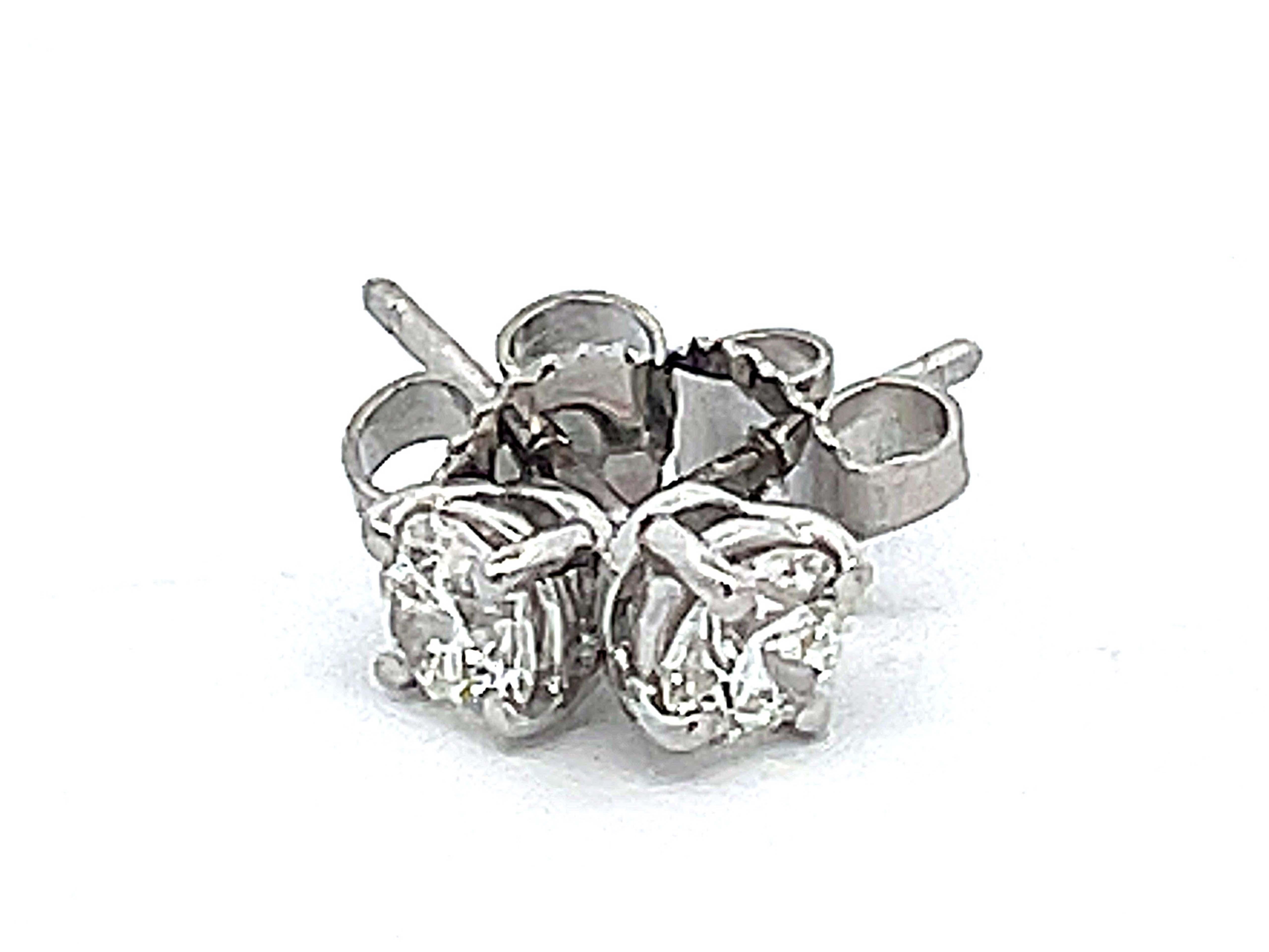 Modern Tiffany Solitaire Diamond Stud Earrings in Platinum 0.58 ct