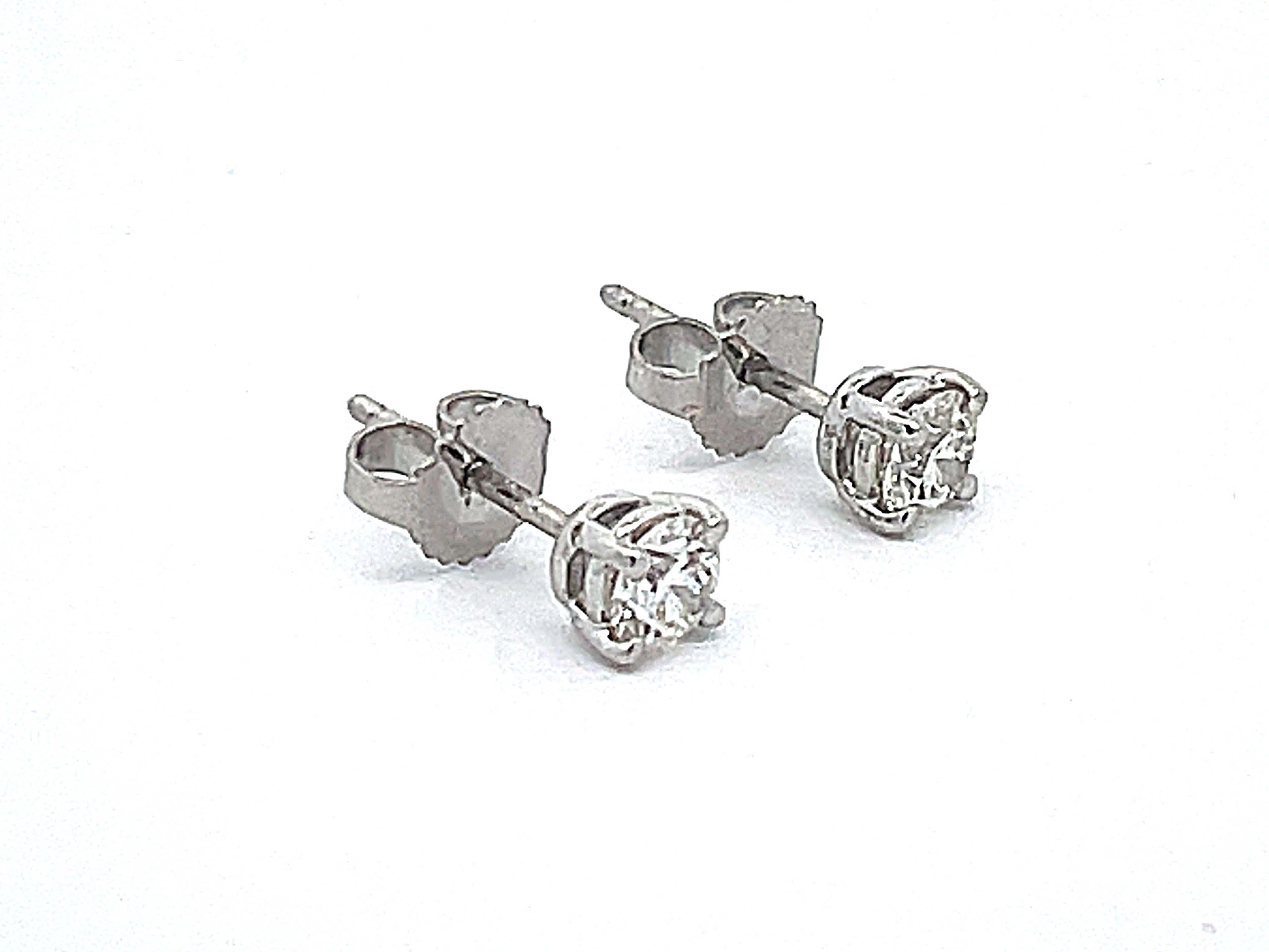 Brilliant Cut Tiffany Solitaire Diamond Stud Earrings in Platinum 0.58 ct