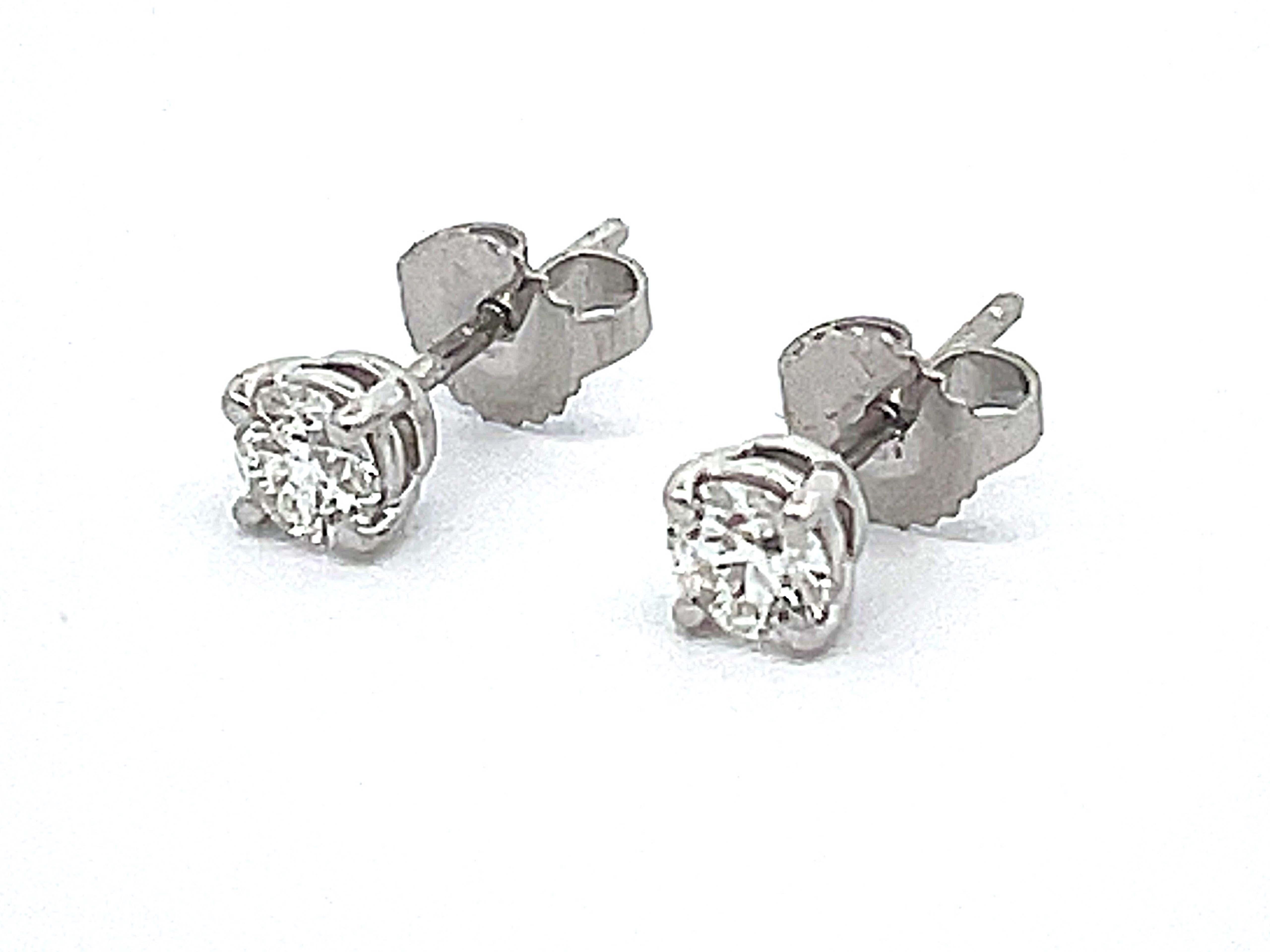 Tiffany Solitaire Diamond Stud Earrings in Platinum 0.58 ct In Excellent Condition In Honolulu, HI